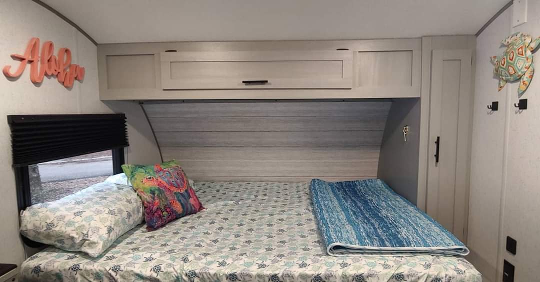 Queen Murphy bed that can be put away for access to the plush sofa. 3" topper provided for comfort.. Forest River Salem 2022