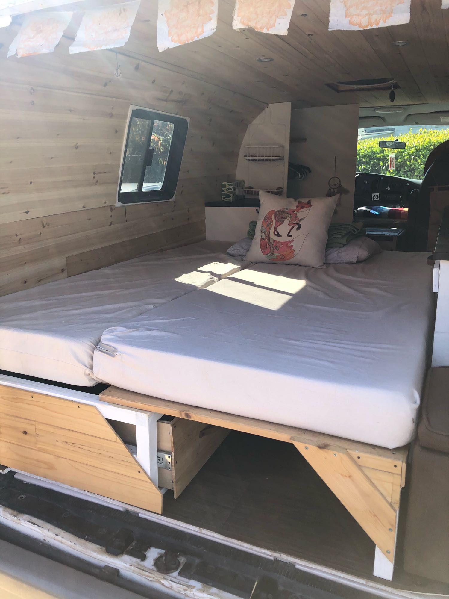The bed pulled out for sleeping - comfortably sleeps 2. . Ford Econoline 150 2005
