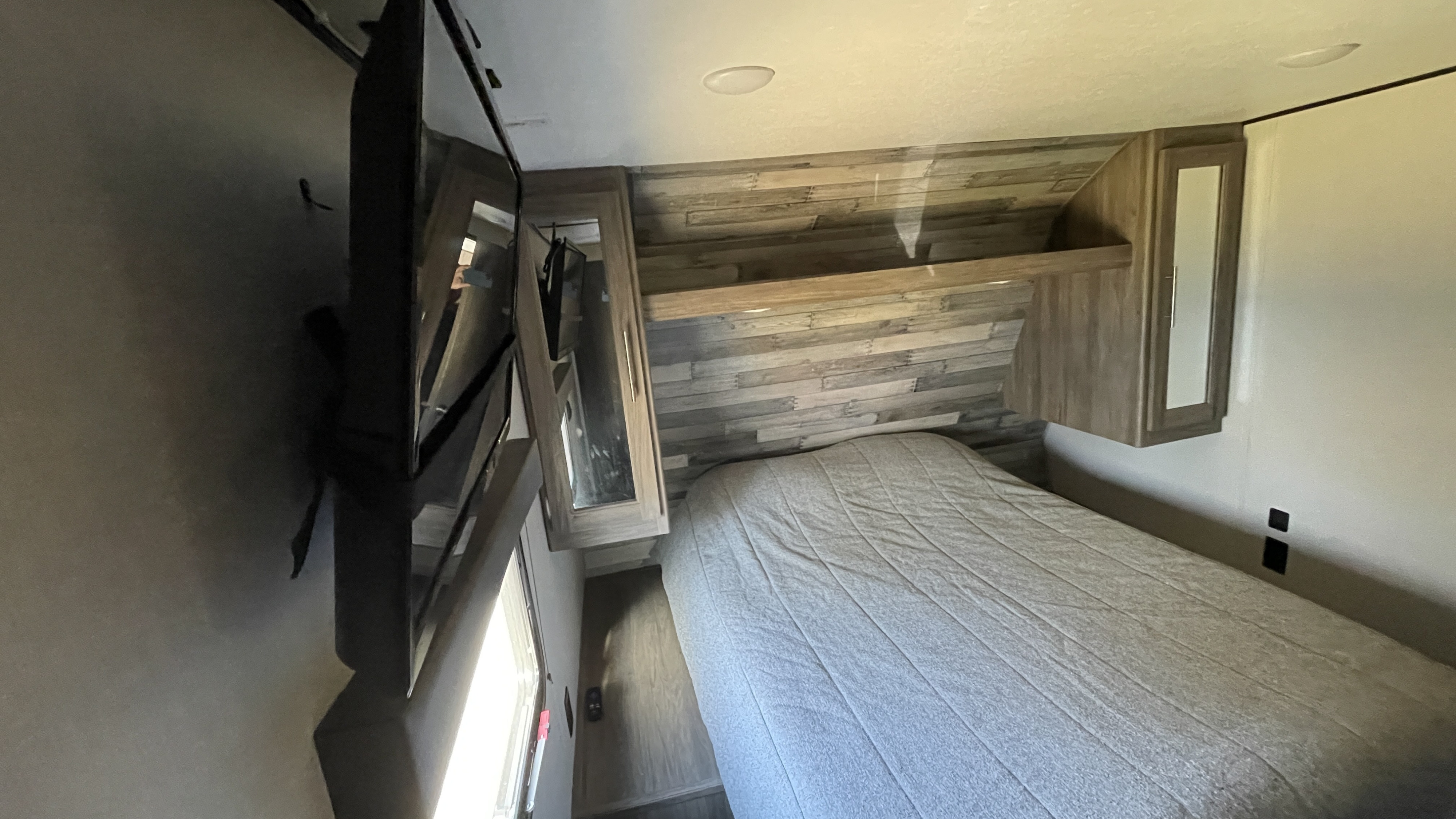 Master bedroom with on suite bathroom. Crossroads RV Zinger 2020