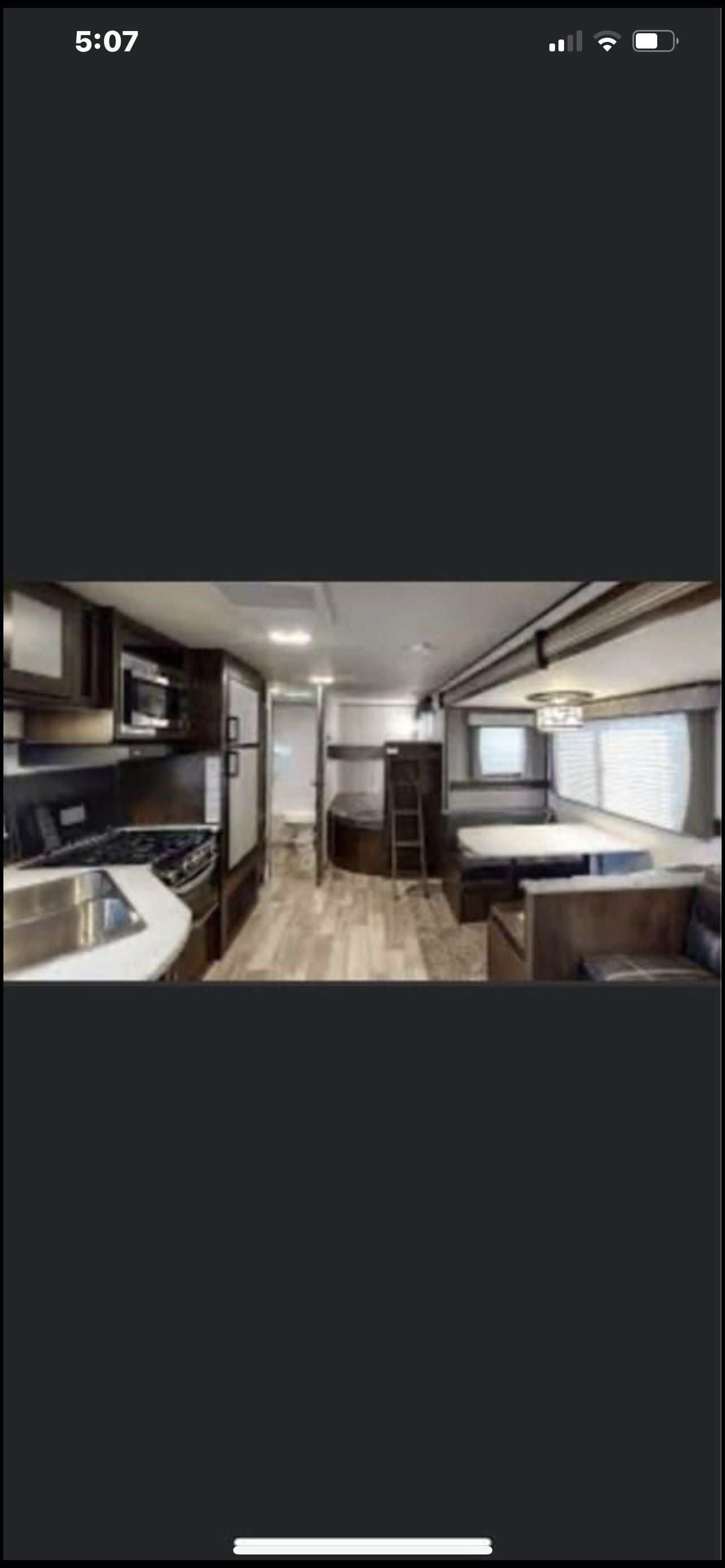 Oversized bunks face the 4K tv for the kiddos to enjoy a movie . Heartland Pioneer BH270 2021