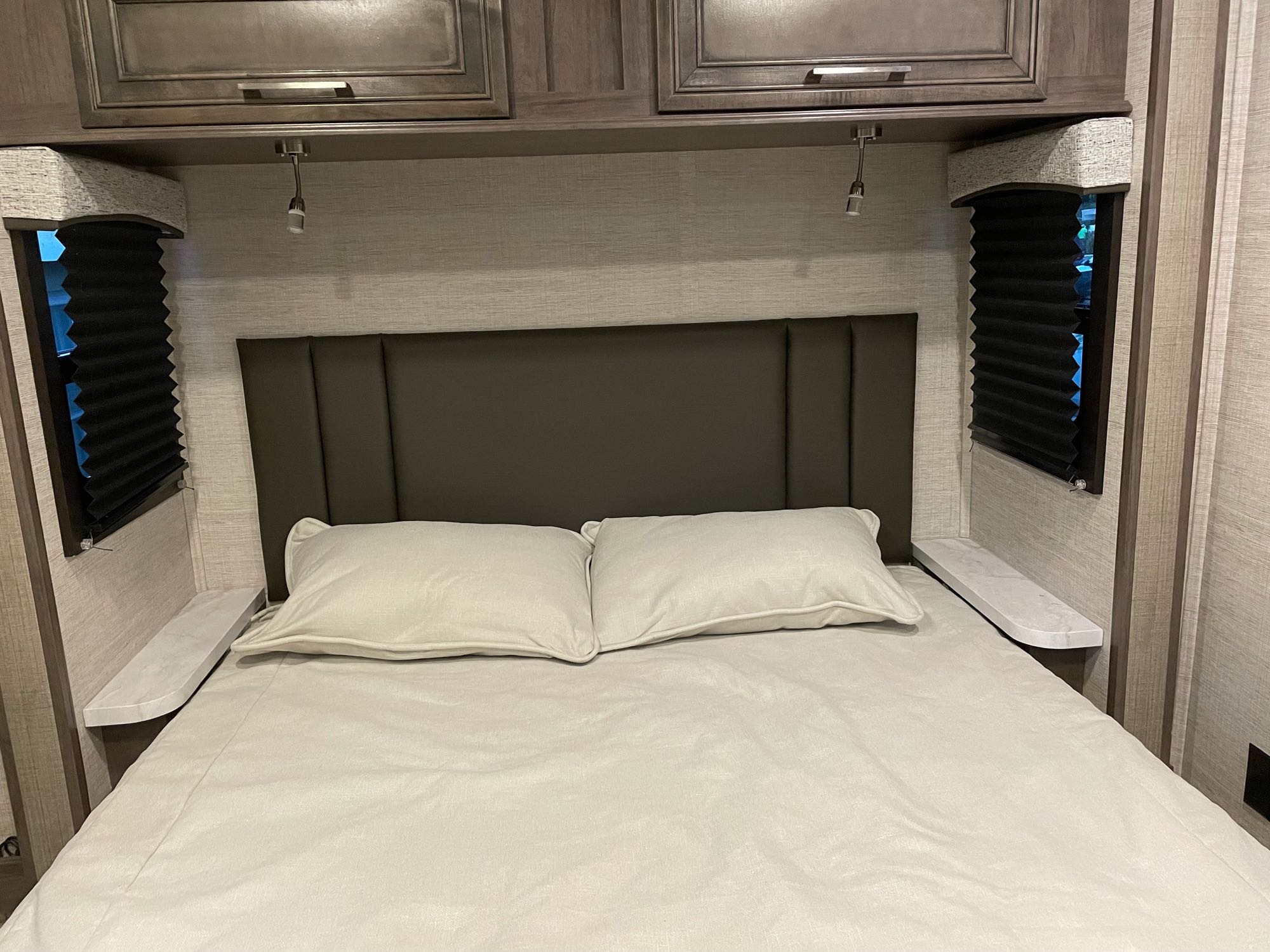 This is an RV Queen bed that sleeps 2 adults. Entegra Coach Odyssey 2022