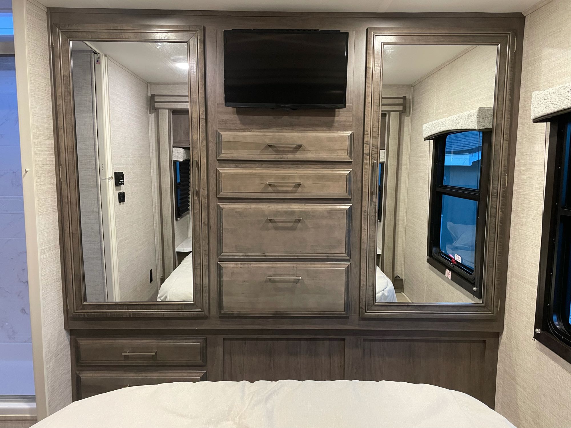 Bedroom closet with mirrors. Entegra Coach Odyssey 2022