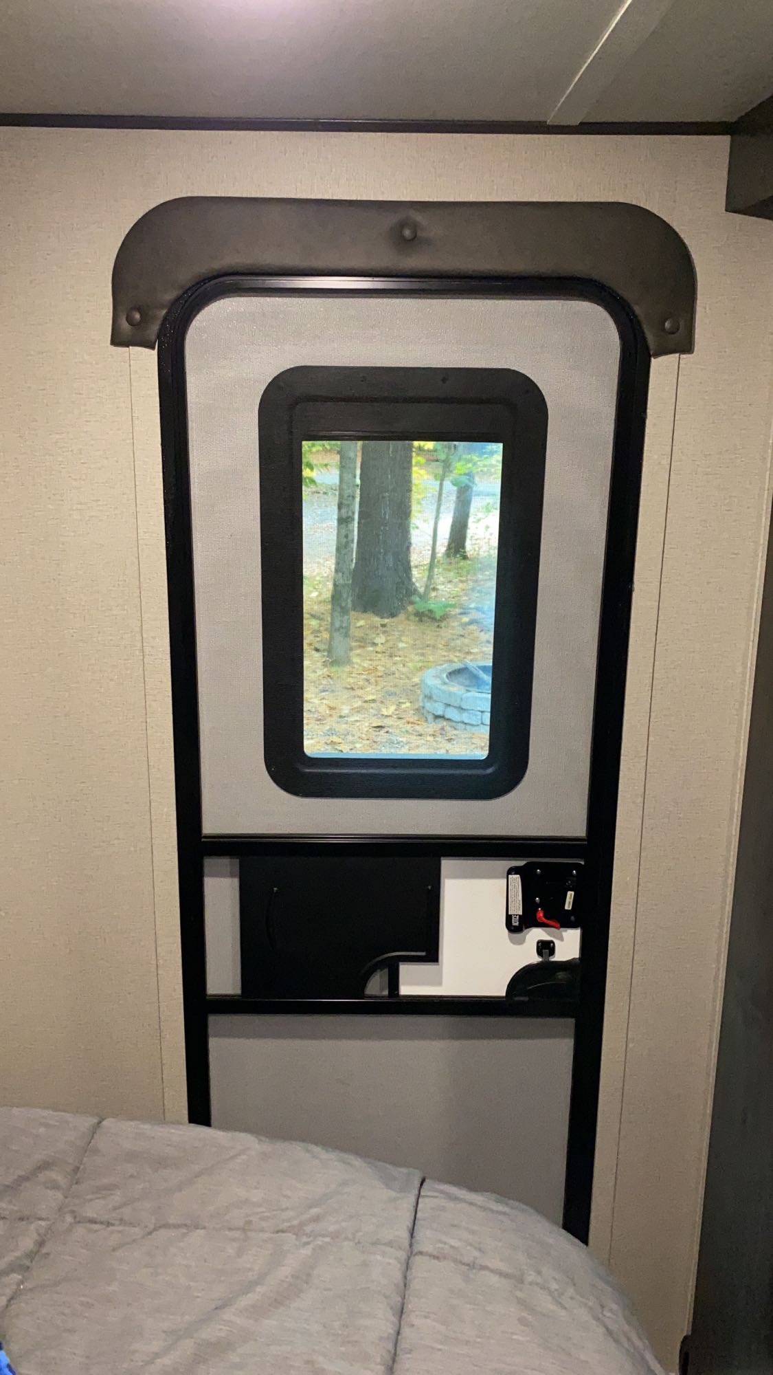 Private entry master bedroom door with added tinted window & shade.. Grand Design Transcend Xplor 2020