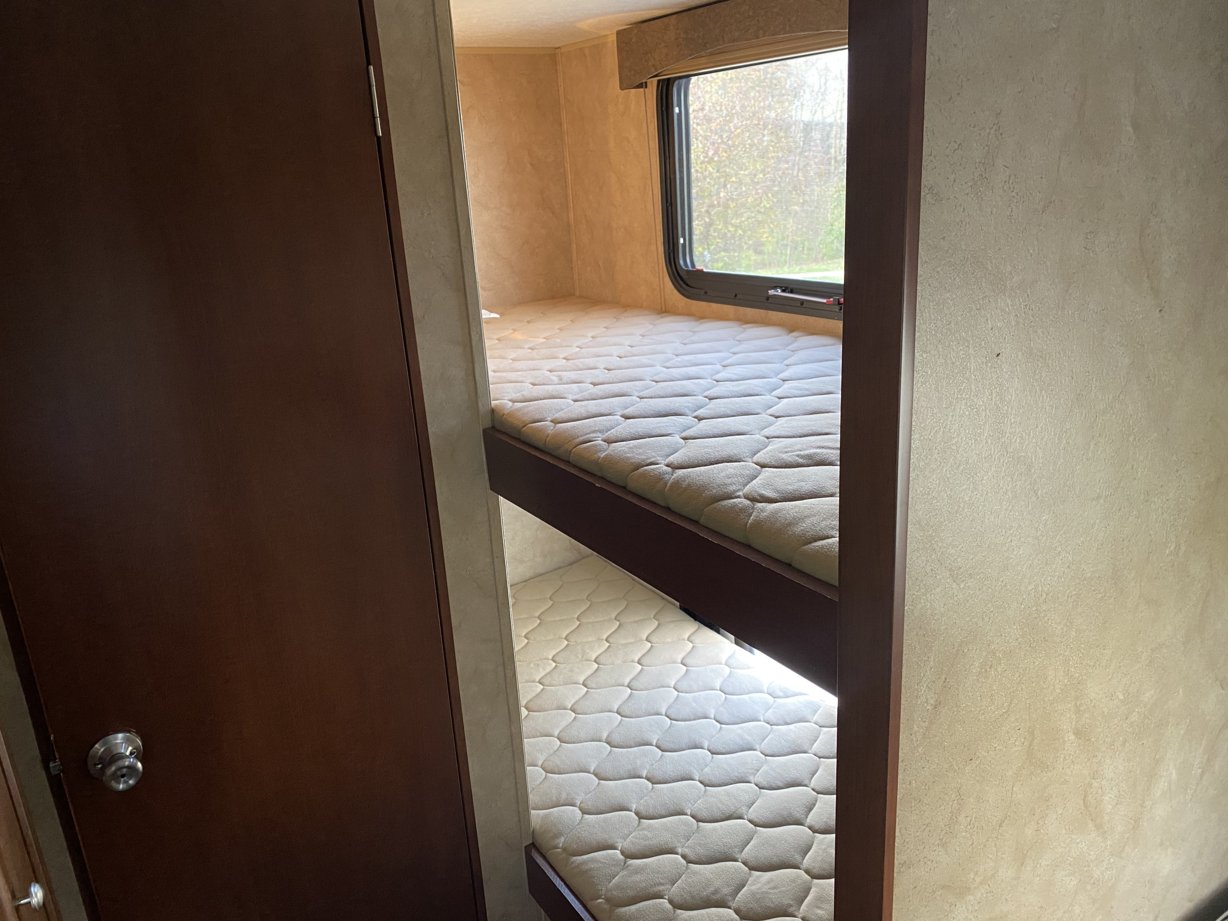 Two bunks with reading lights. Forest River Viking 2015