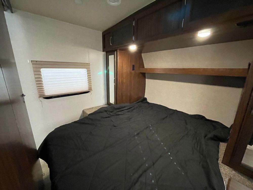 Full queen bed for your comfort and privacy doors =-). Forest River Palomino Solaire 2021