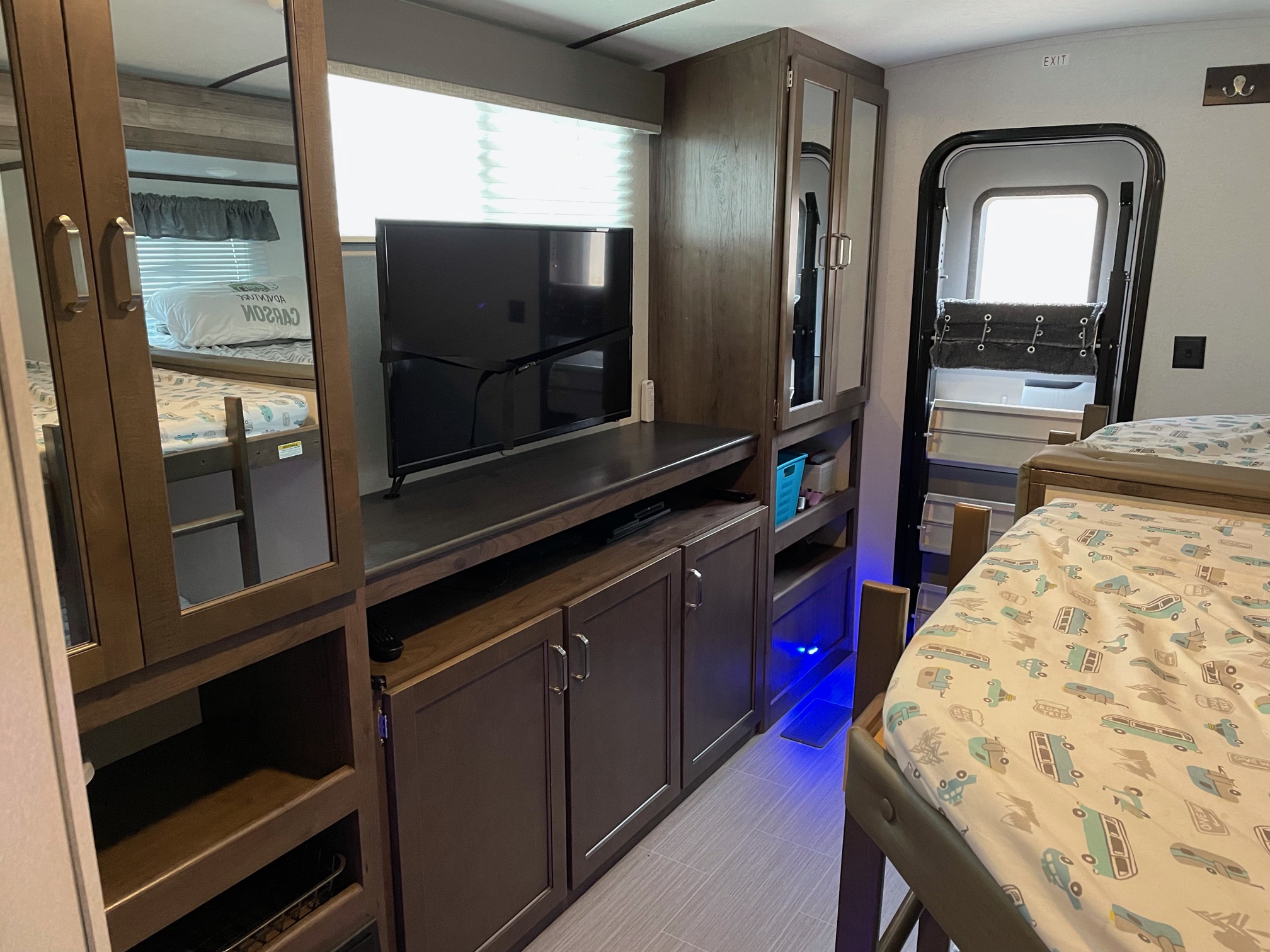Full size bunks and plenty of storage with tv.. Keystone RV Passport SL 2020