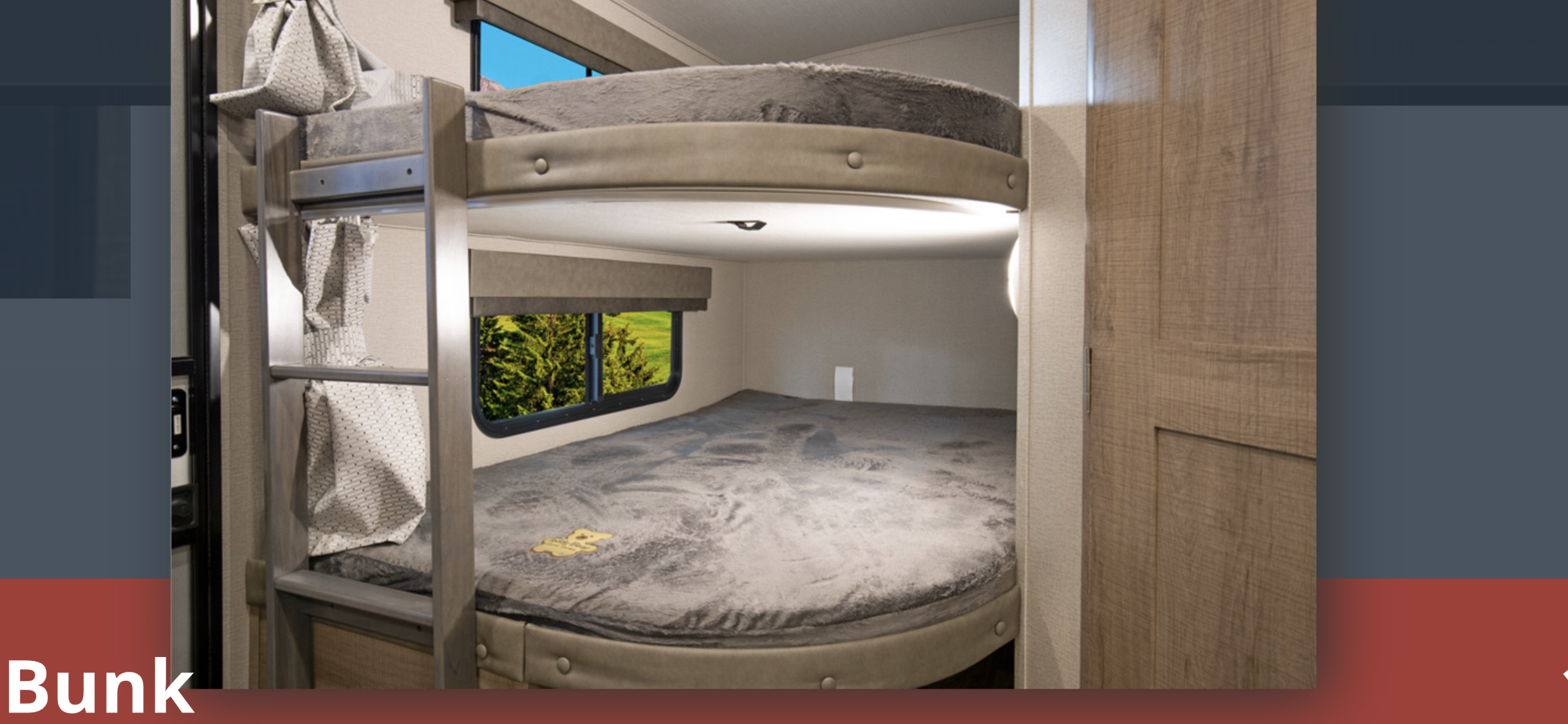 RV rental: Bright interior with cozy bunk beds, ladder, and window views. Ideal sleeping area for your travel adventures.. Grand Design Imagine 2021
