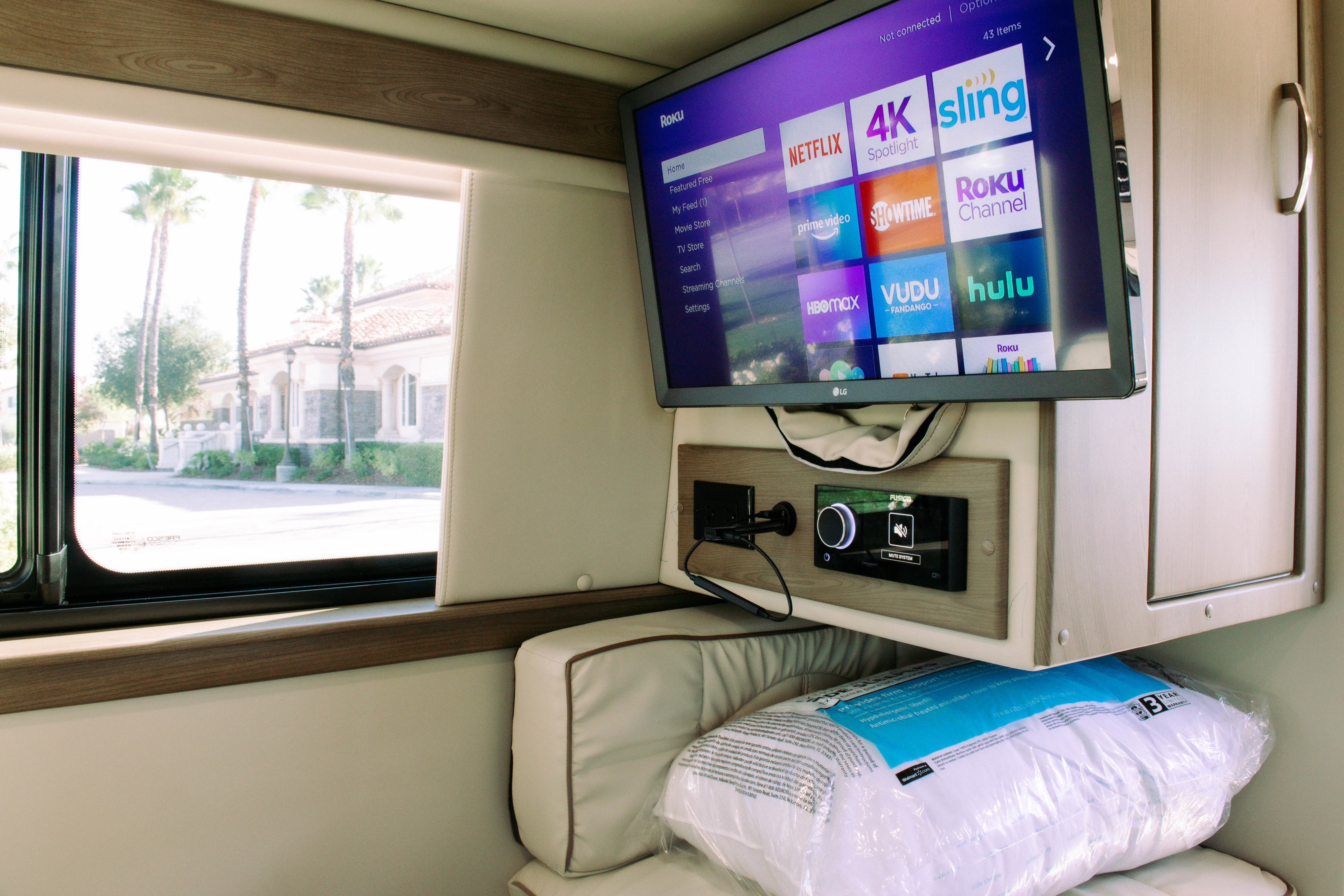 RV rental interior features a TV with Roku streaming apps, providing cozy entertainment and comfort on the go.. Midwest Automotive Design Mercedes Benz passage 2022