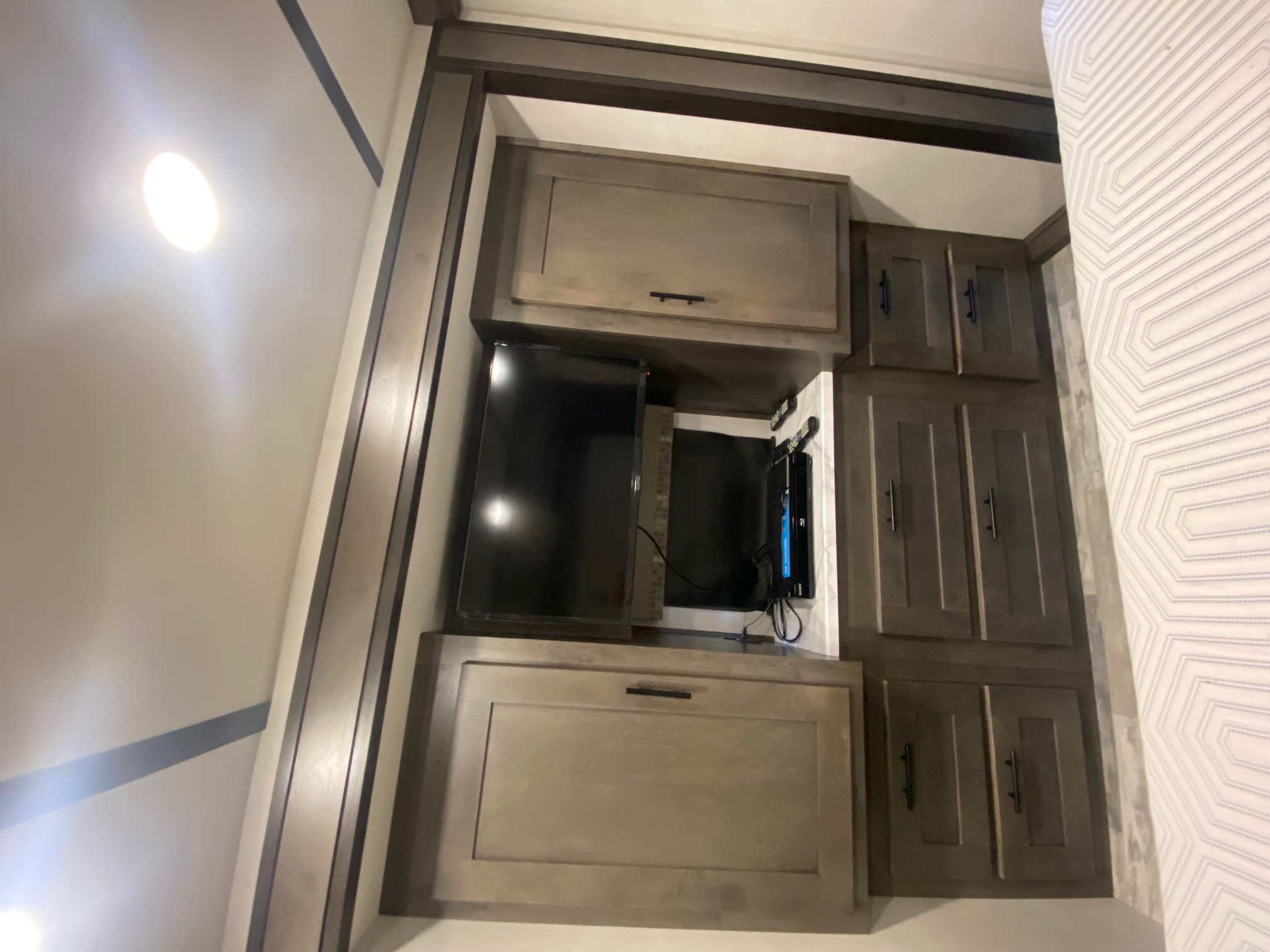 RV rental: Modern interior with built-in TV and ample storage cabinets, offering comfort on the go.. Forest River Other 2021