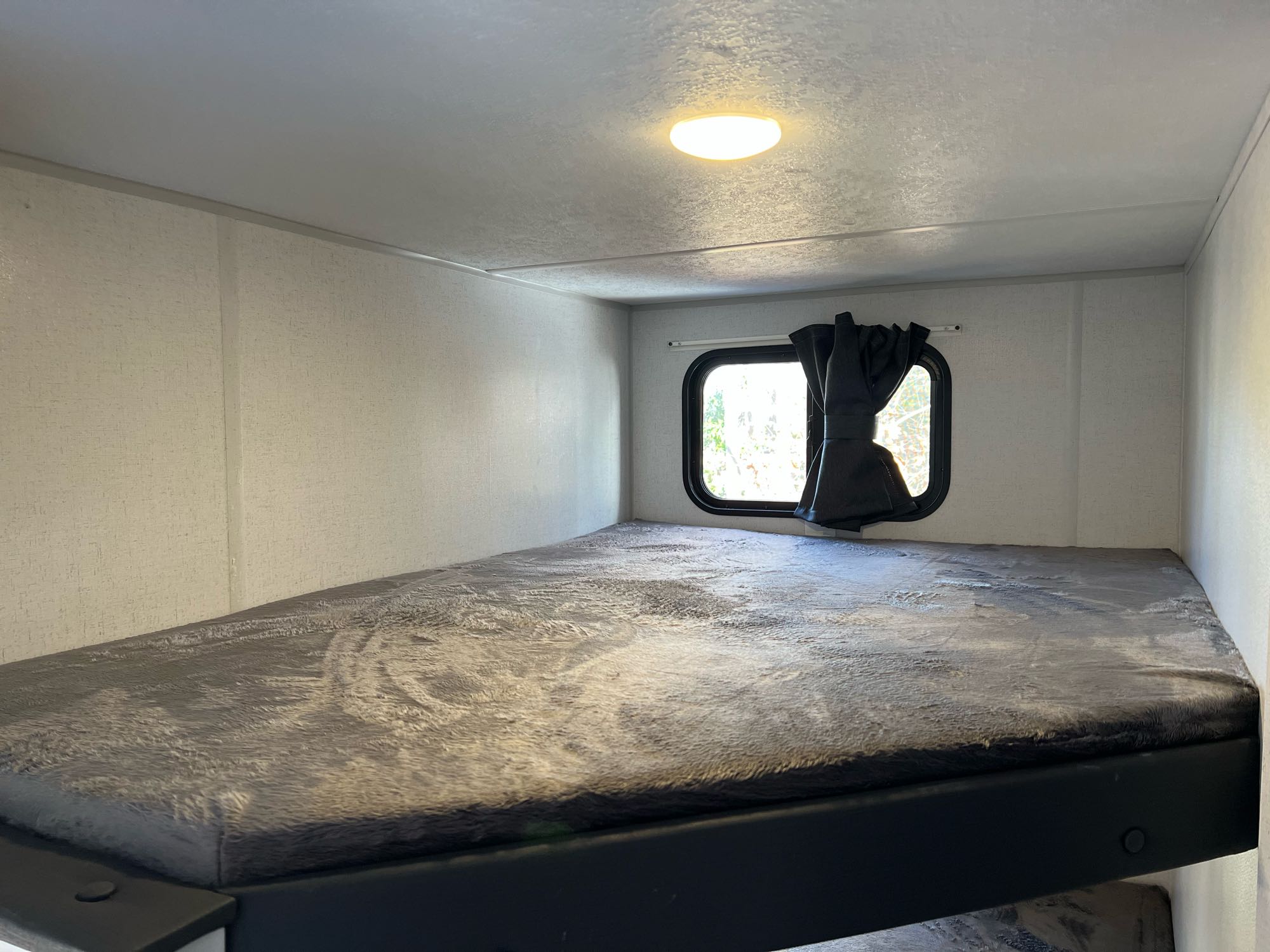 Full size bunk with teddybear mattress and window. Forest River Other 2022