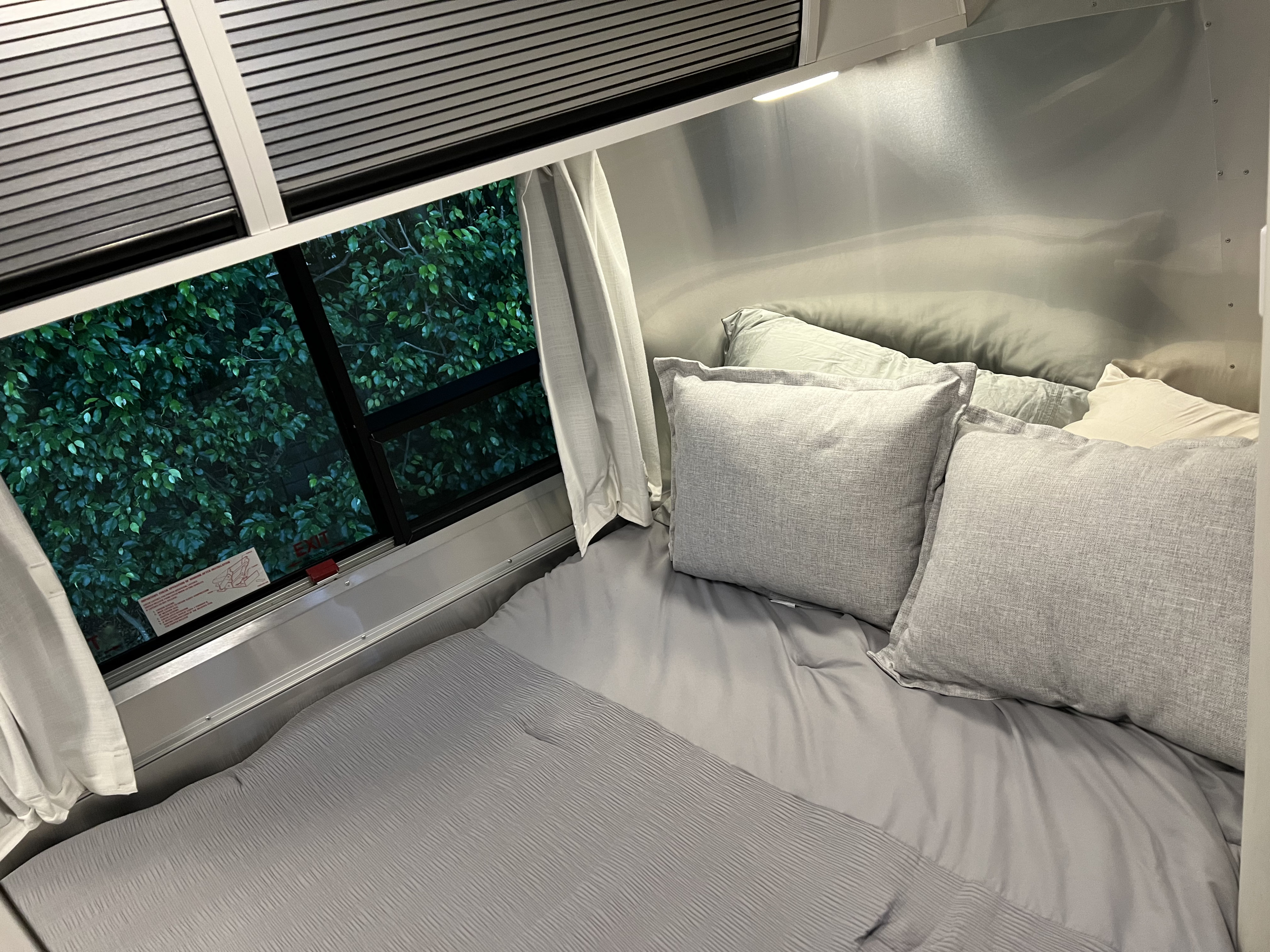 Get cozy in Key Bambi's Queen Sized bed.. Airstream Bambi 2022