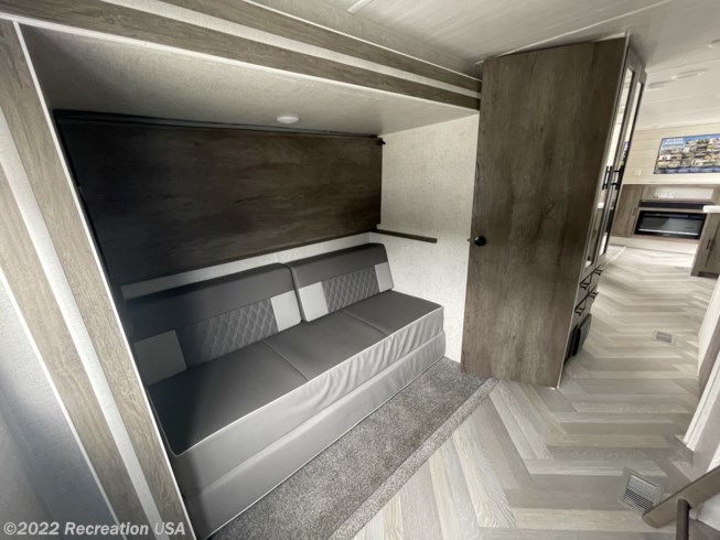 Sofa converts to queen size comfy bed and there is a bunk above and a bunk across. Forest River Salem 2021