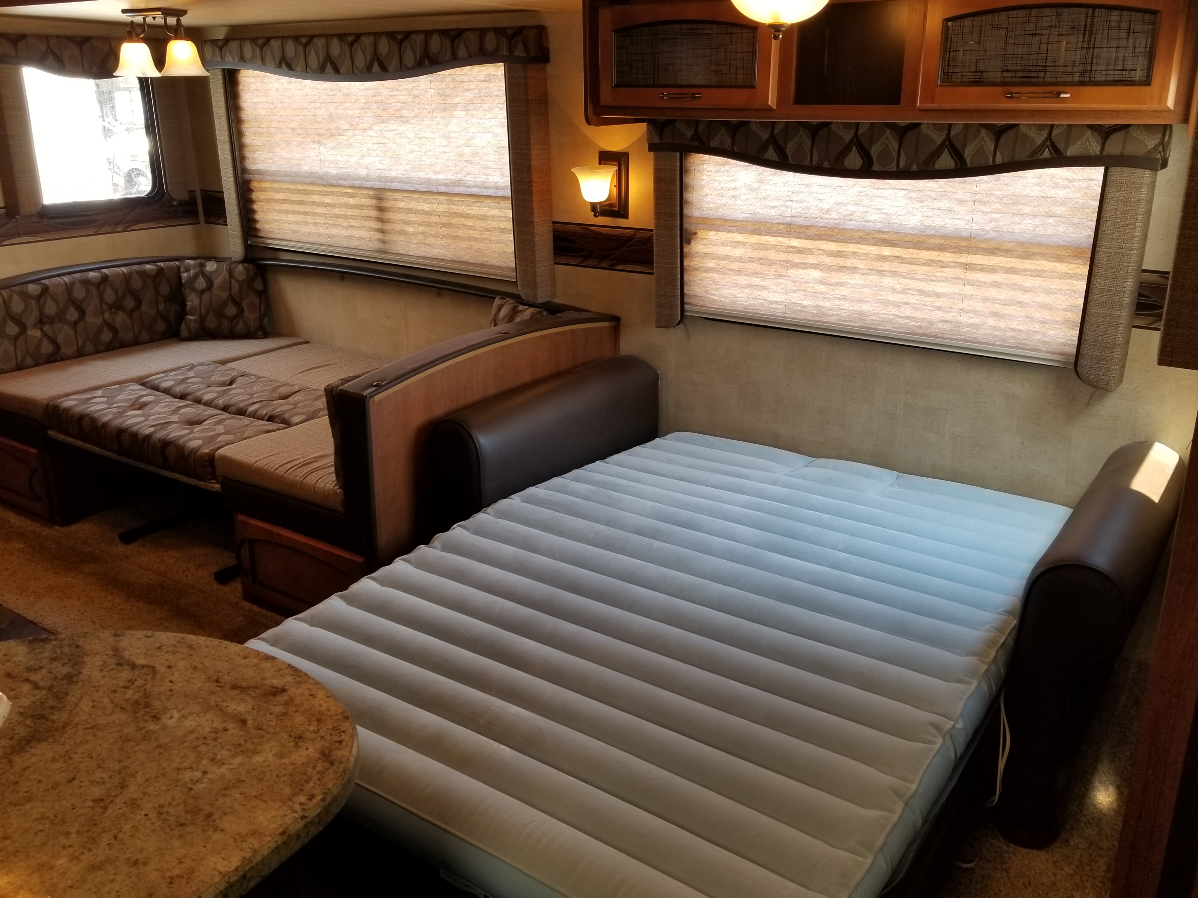 Dining room/ Living room converted to sleeping quarters. . Keystone RV Springdale 2013