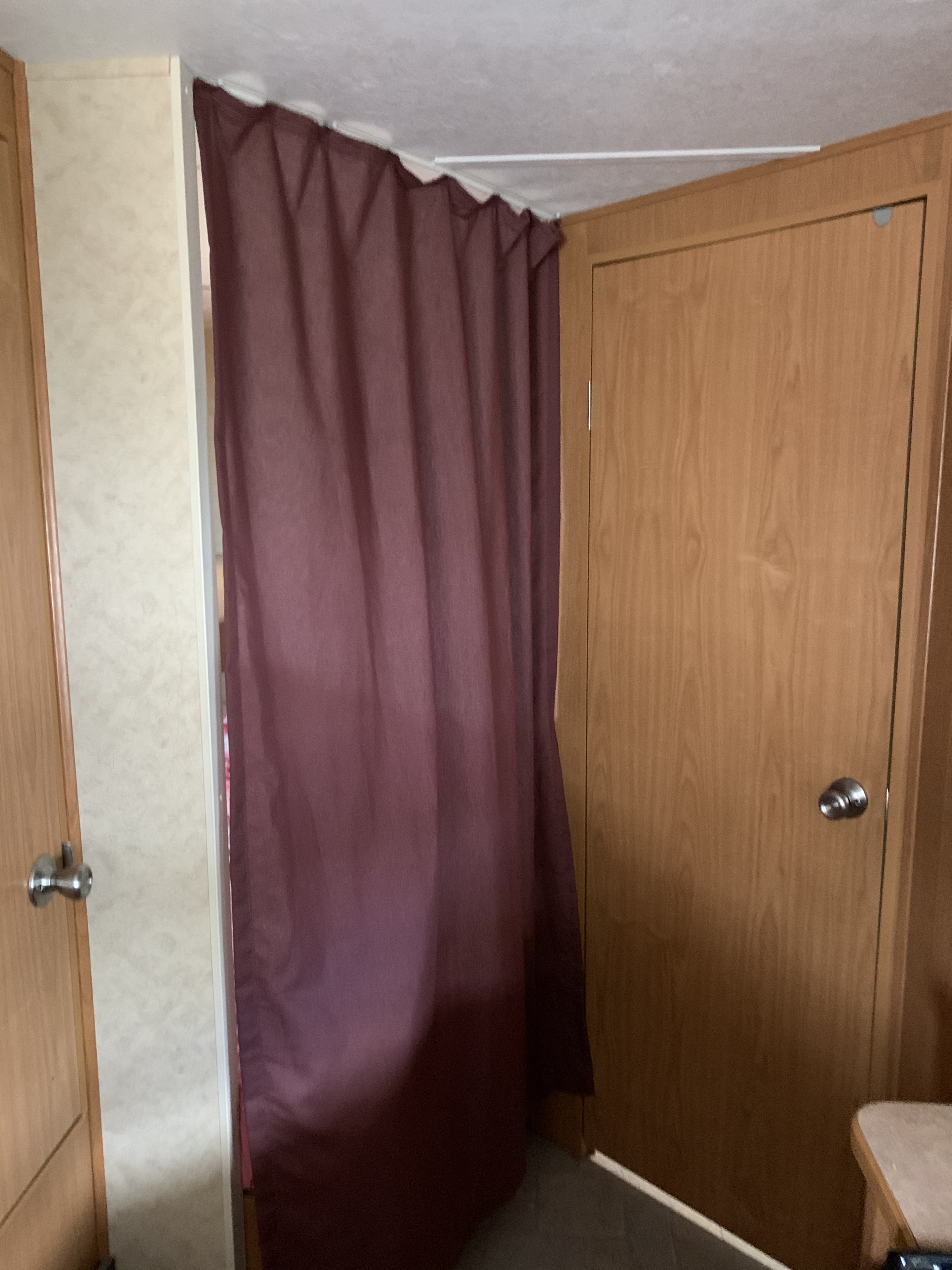 bunk area with privacy curtain . Dutchmen Lite 2005