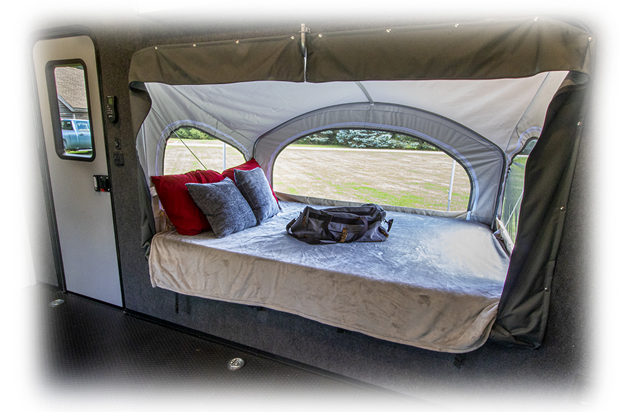 Experience an RV rental with a unique pop-out tent bed! Enjoy comfortable sleeping & panoramic outdoor views.. InTech RV Flyer Discover 2021