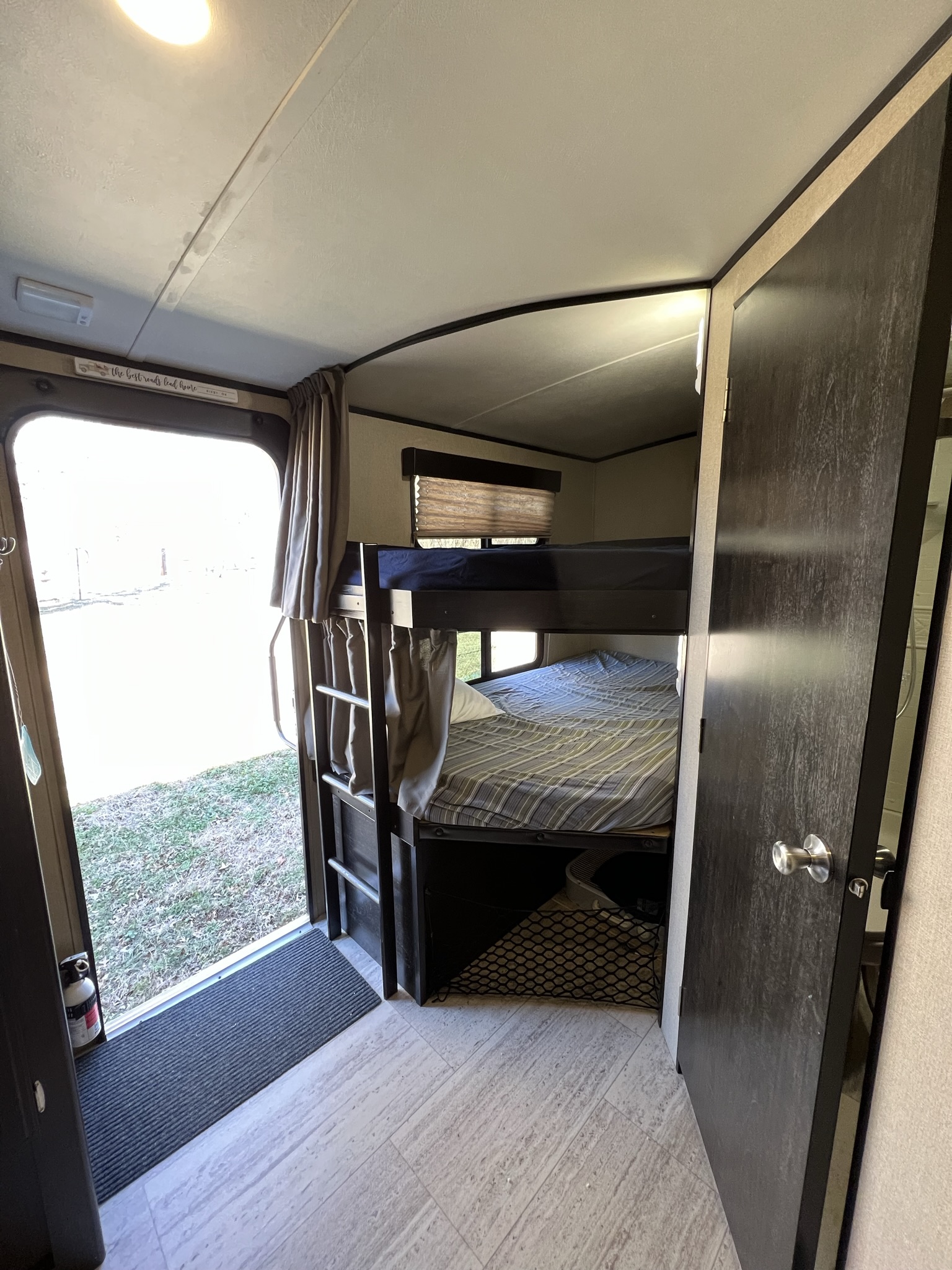 Bunk beds come with foam mattresses and ample bedding (pillows, sheets, blankets). Plenty of storage underneath. More sleeping areas throughout.. Grand Design Imagine 2017