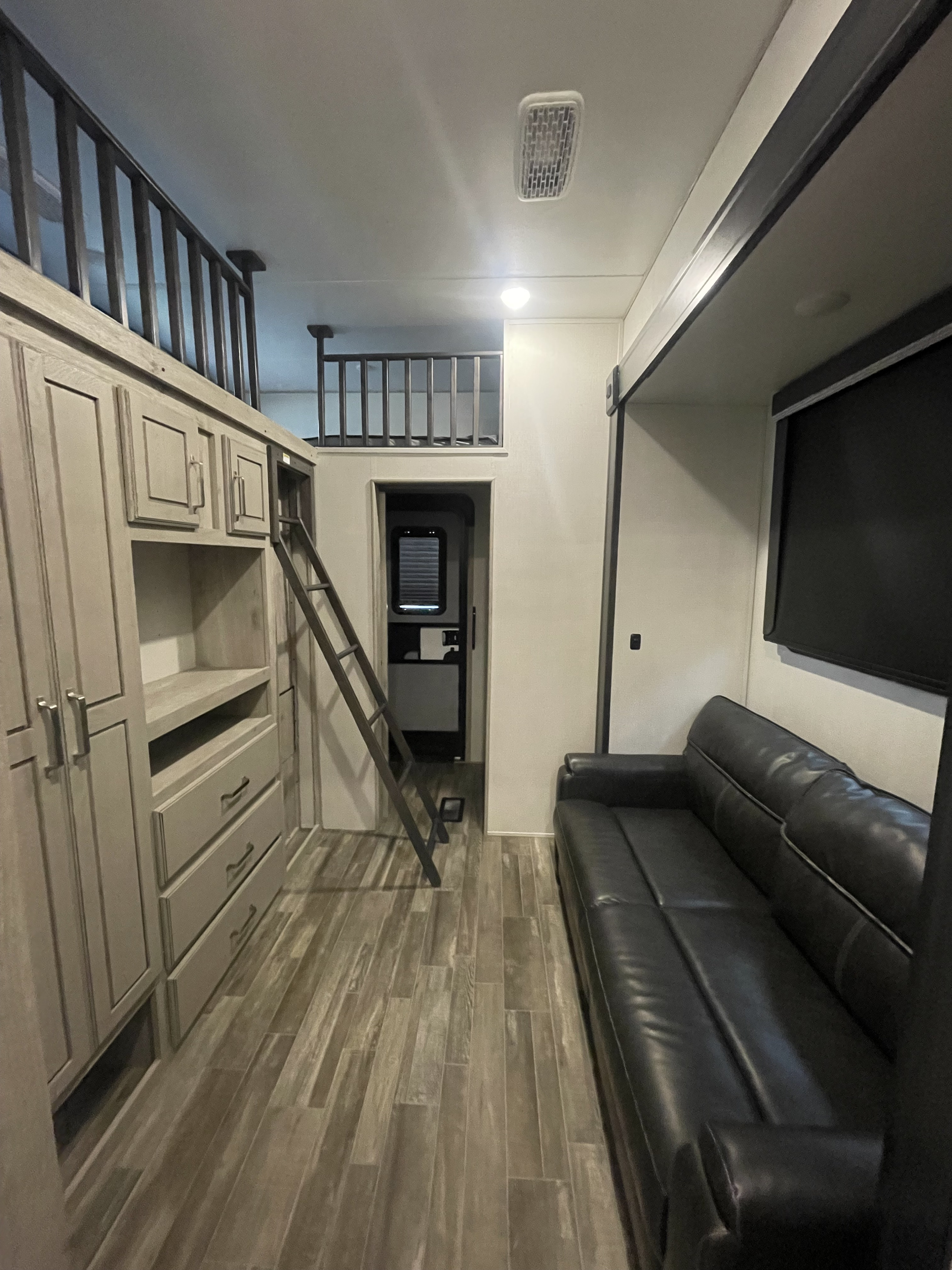 Sofa pulls out to full-size bed
The loft has 2 nearly twin-size beds and storage cabinet. Second bath and exit through 2nd bed.. Keystone RV Avalanche 2021