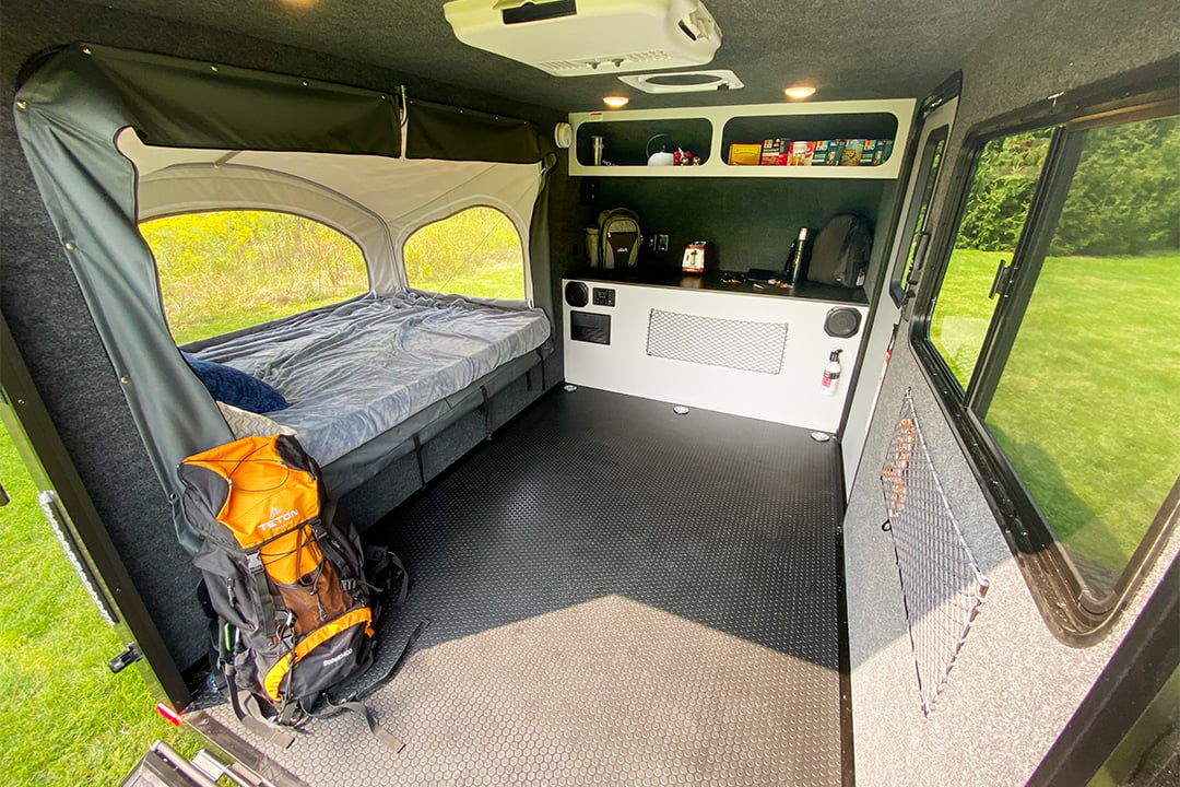 Ample room for 2-4 sleeping (stock photo). Note that our model has cabinets up front.. Intech Explorer 2019