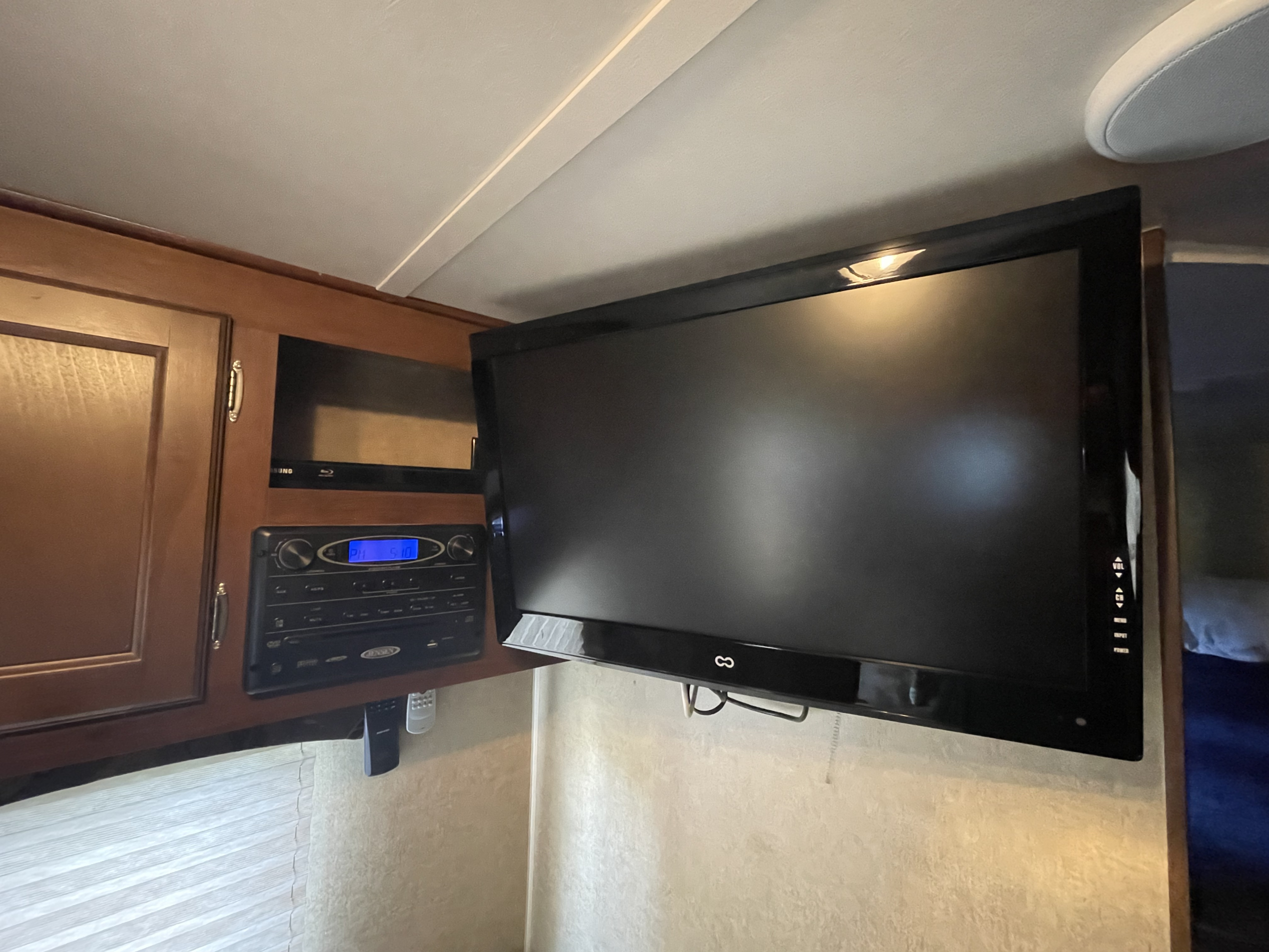 RV rental: Wall-mounted TV, Blu-ray, and stereo system in a well-equipped RV interior.. Jayco Jay Flight Swift SLX 2014