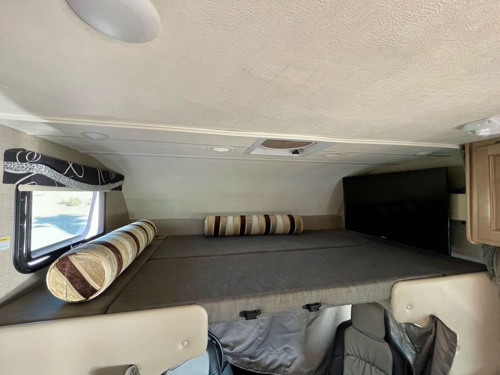 TV is on a swivel mount. Thor Motor Coach Outlaw 2018