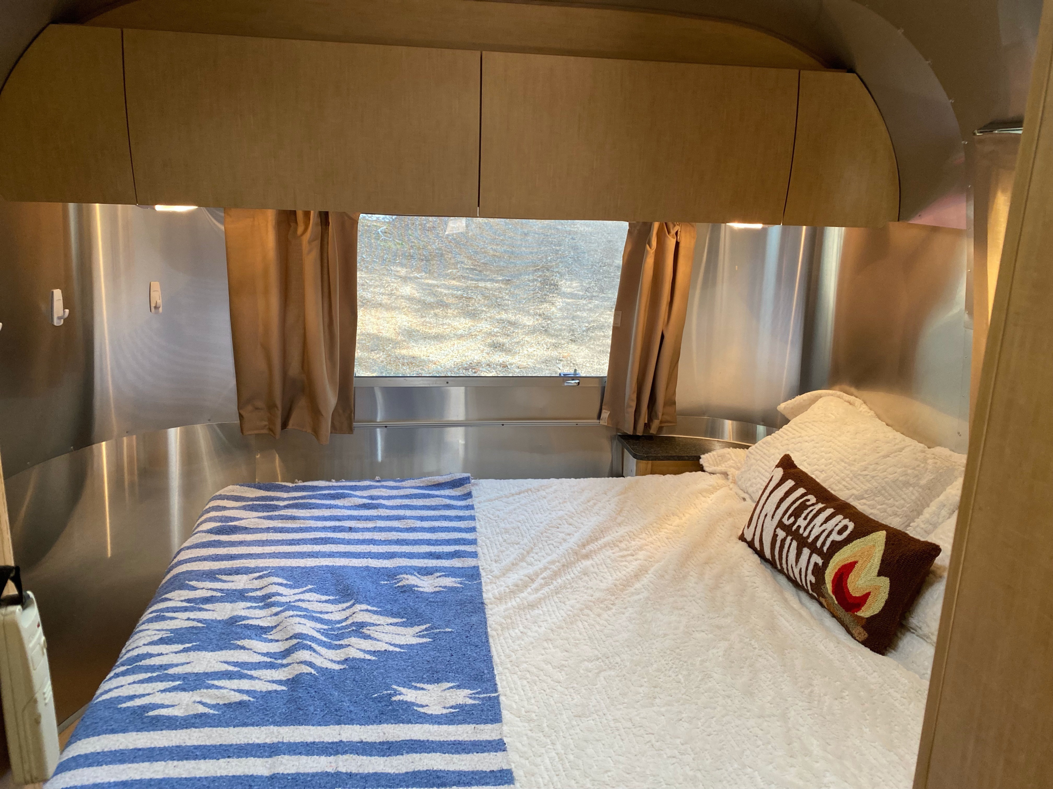 Short Queen size bed. Bedding will change but you get the idea. . Airstream Flying Cloud 2010