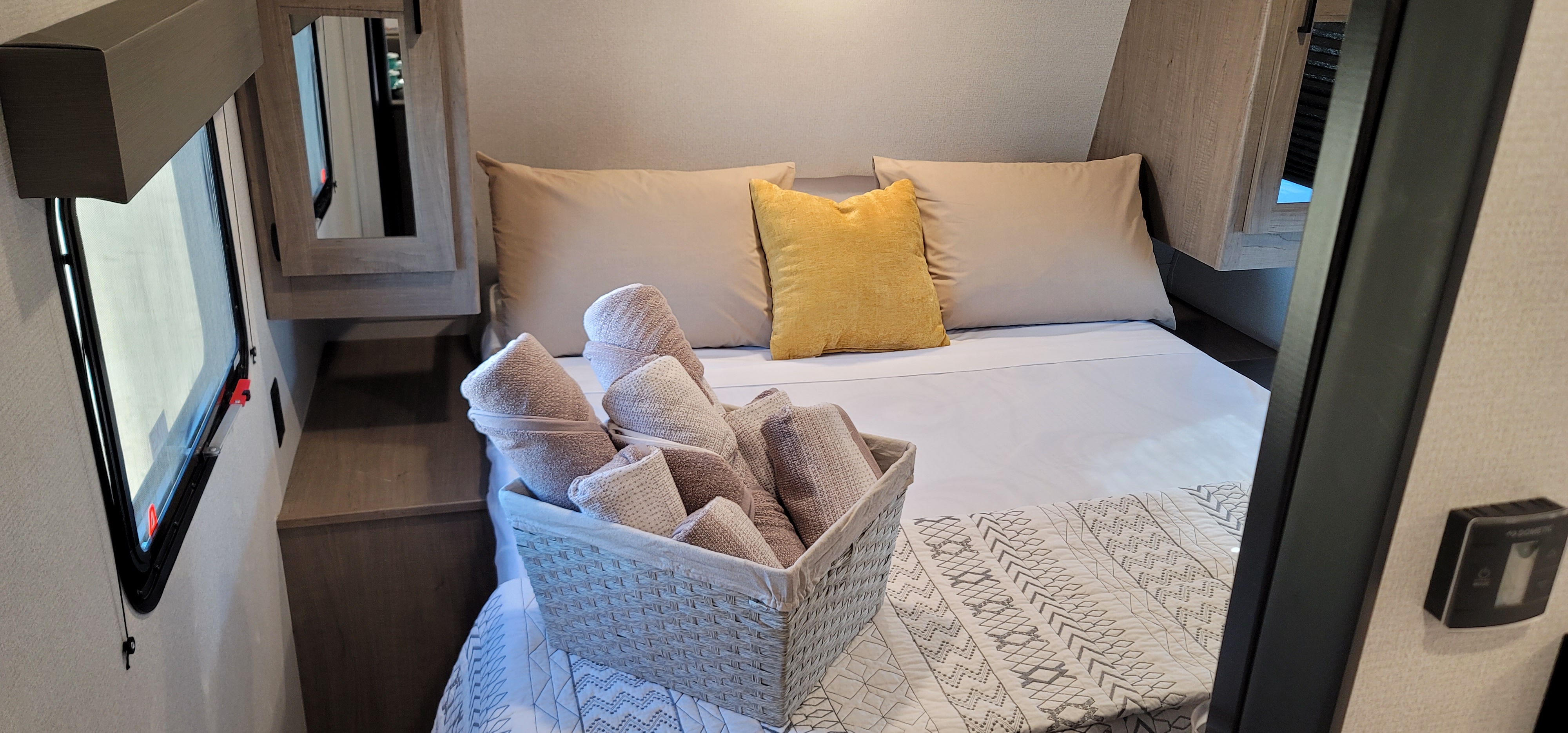 Step inside this cozy RV rental! Enjoy a comfortable bed with soft linens, pillows, and fresh towels.. Keystone RV Hideout Luxury Edition 2021