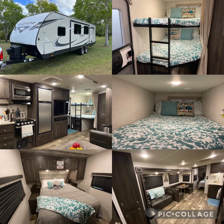 Exterior & interior of an RV rental: modern kitchen, master bedroom, bunk beds, and living space for your adventures.. Starcraft Travel Trailer 2020