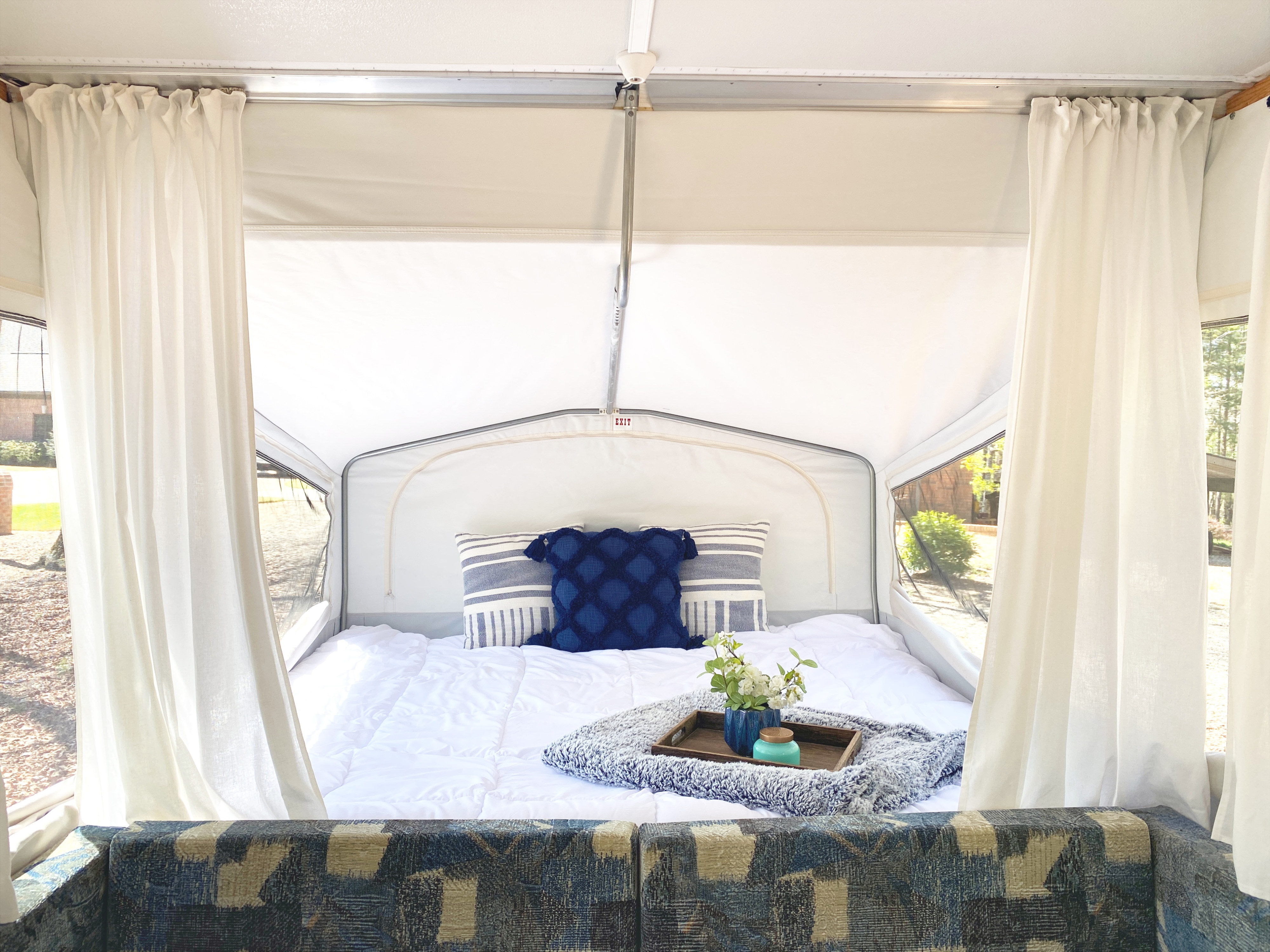 Relax and rejuvenate in a king bed with privacy curtains. Jayco Qwest 2004