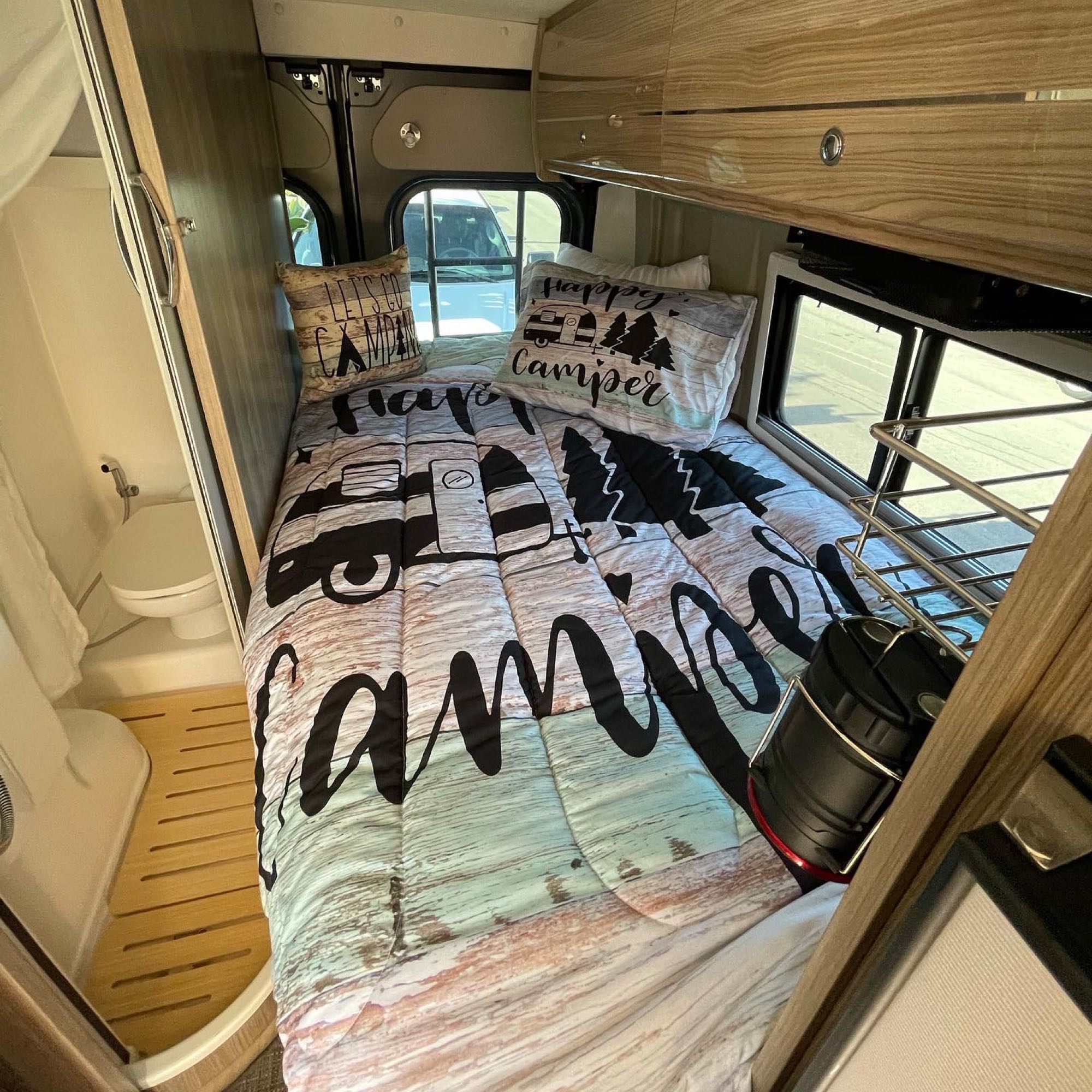 Bed measures a Twin XL. . Winnebago Travato 2020