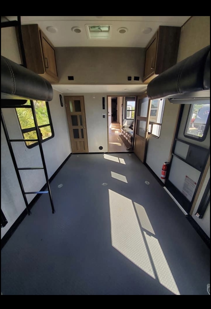 Spacious RV rental toy hauler with large, versatile garage, bunk bed, and windows. Ready for your next adventure!. Dutchmen Endurance 2019