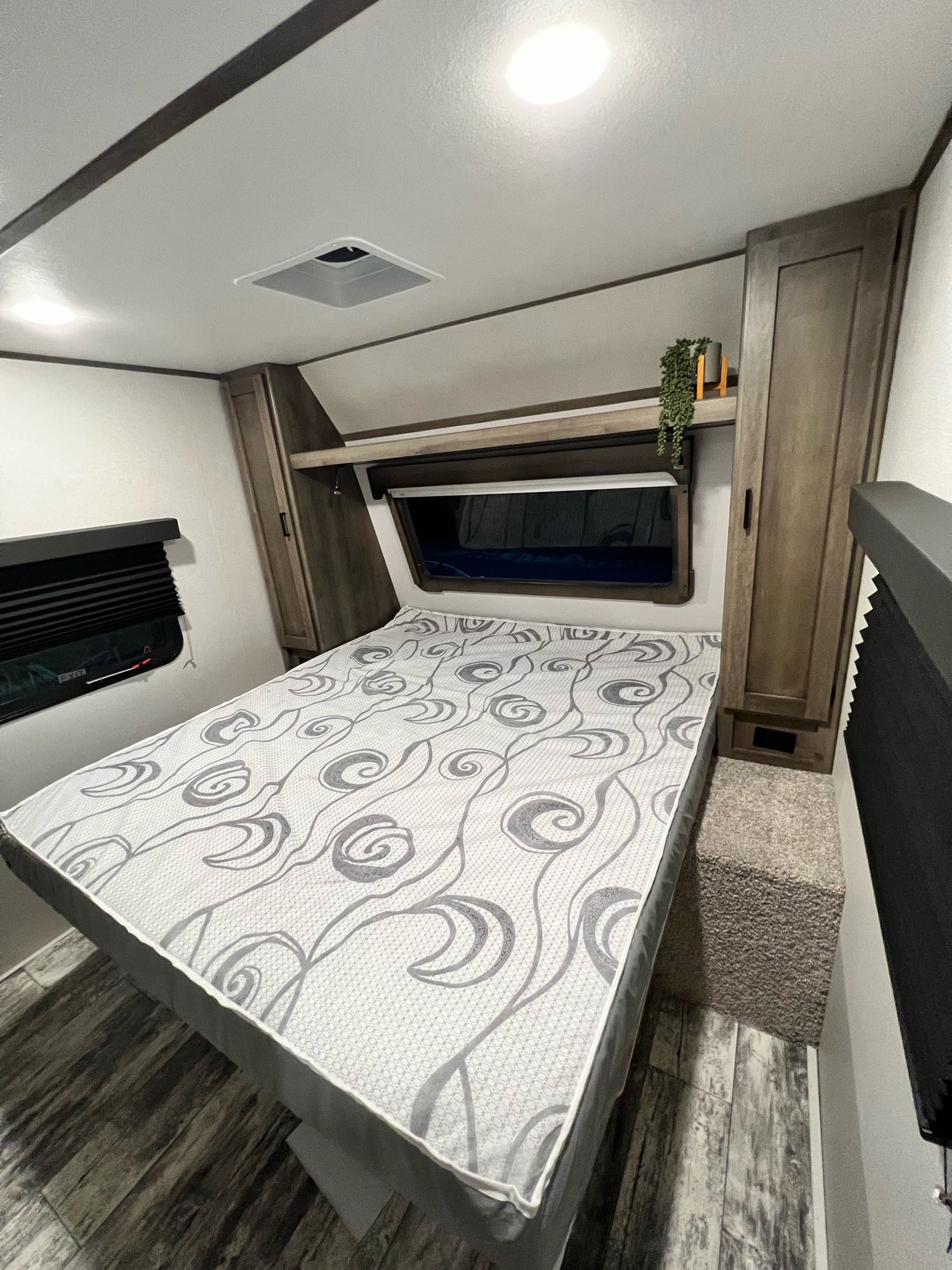 King sized bed with dual “Night Stands” and a huge window with curtains all around. Also his and hers personal closet. Outlets on both sides of the bed for your convenience.. Keystone RV Sprinter Limited 2020