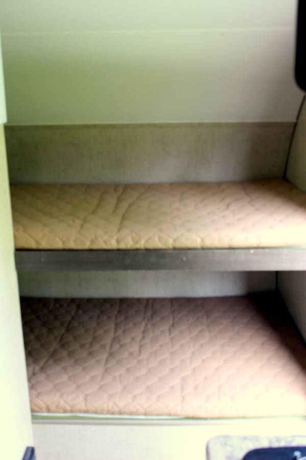 RV rental interior: two cozy bunk beds with quilted pads for comfortable travel sleep.. R-Pod Hood River Edition 2016
