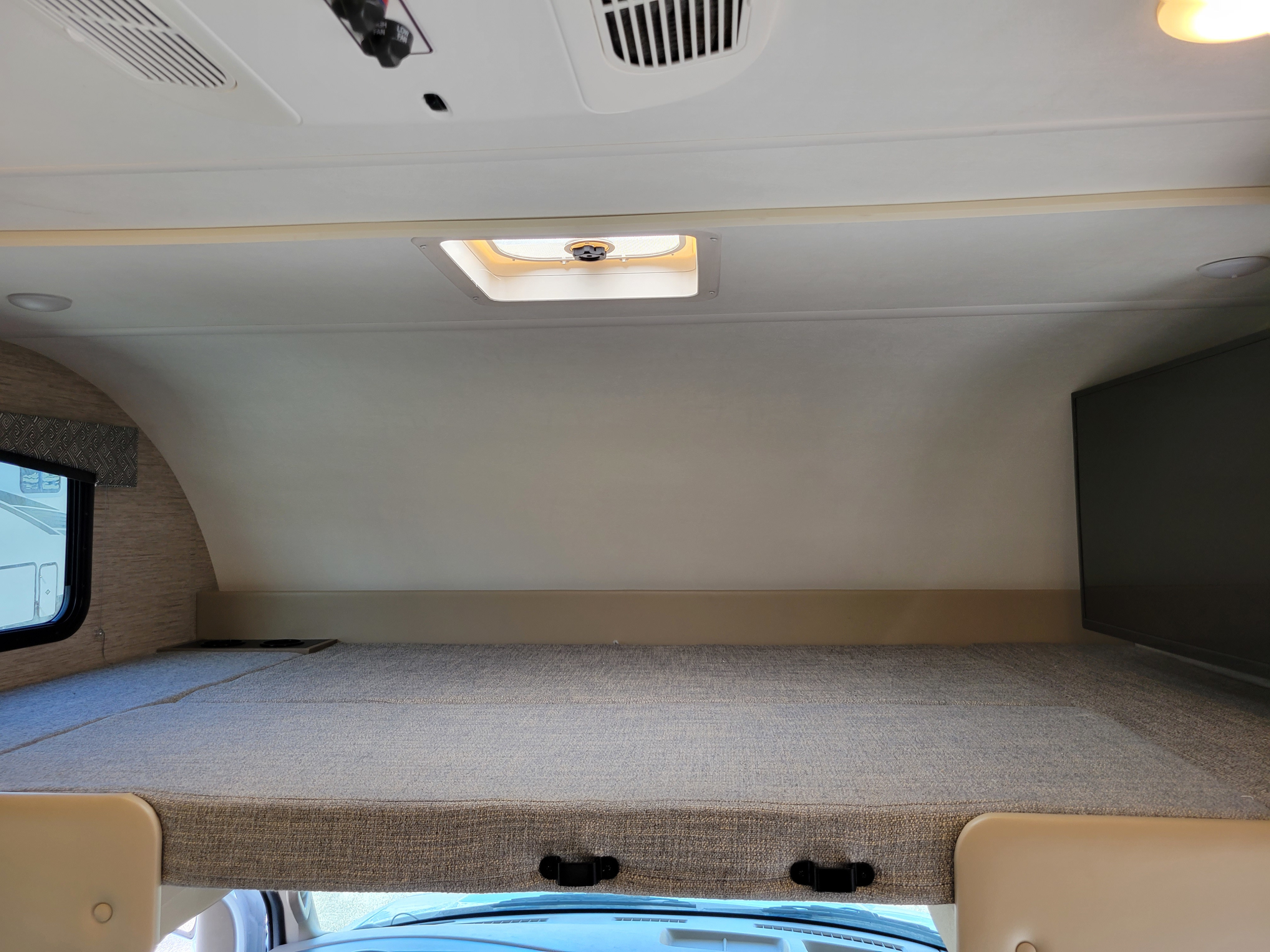 Spacious bunk above the cockpit. Thor Chateau 2022
