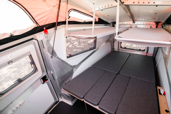 Shown with the kids berths deployed. We remove these if not needed for extra head space. (Stock Photo from Taxa). Taxa Cricket 2022