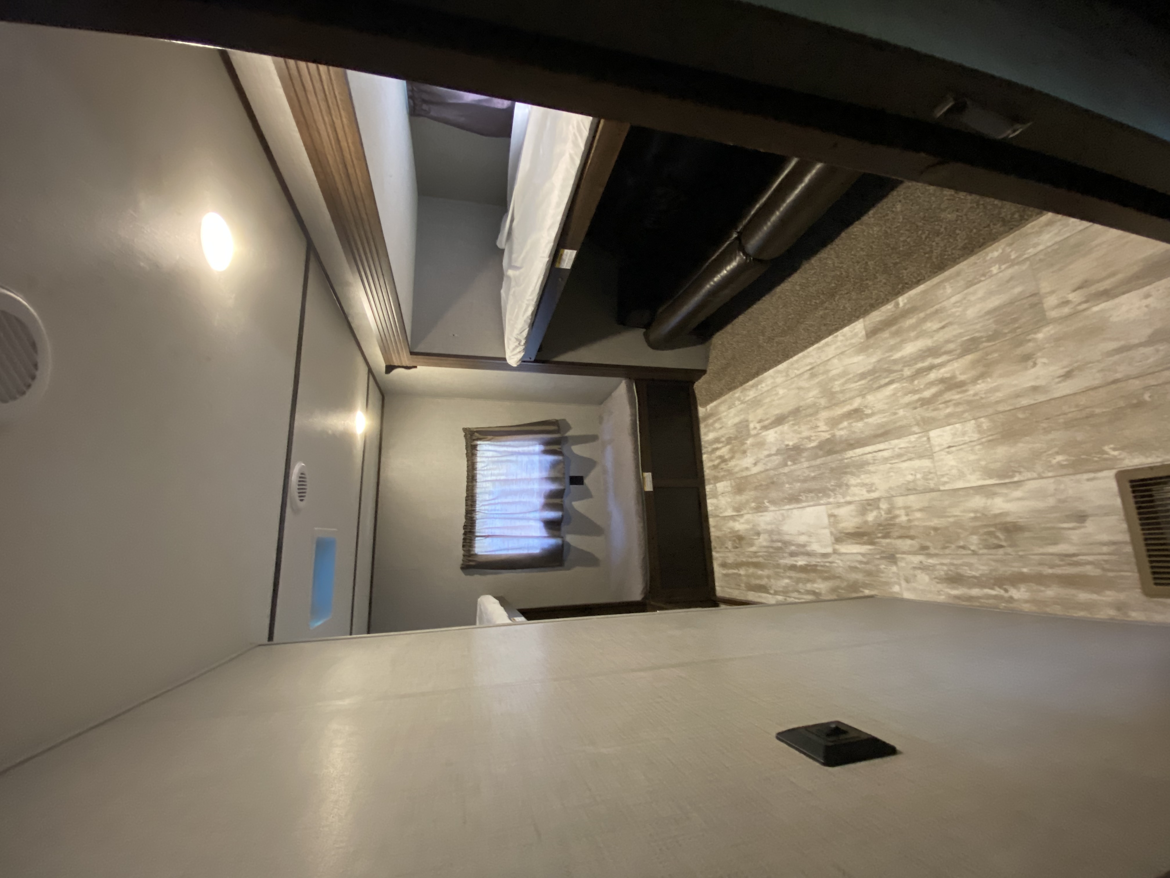 Bunk Room with 3 bunks and one fold down sofa. . Crossroads RV Zinger 2020