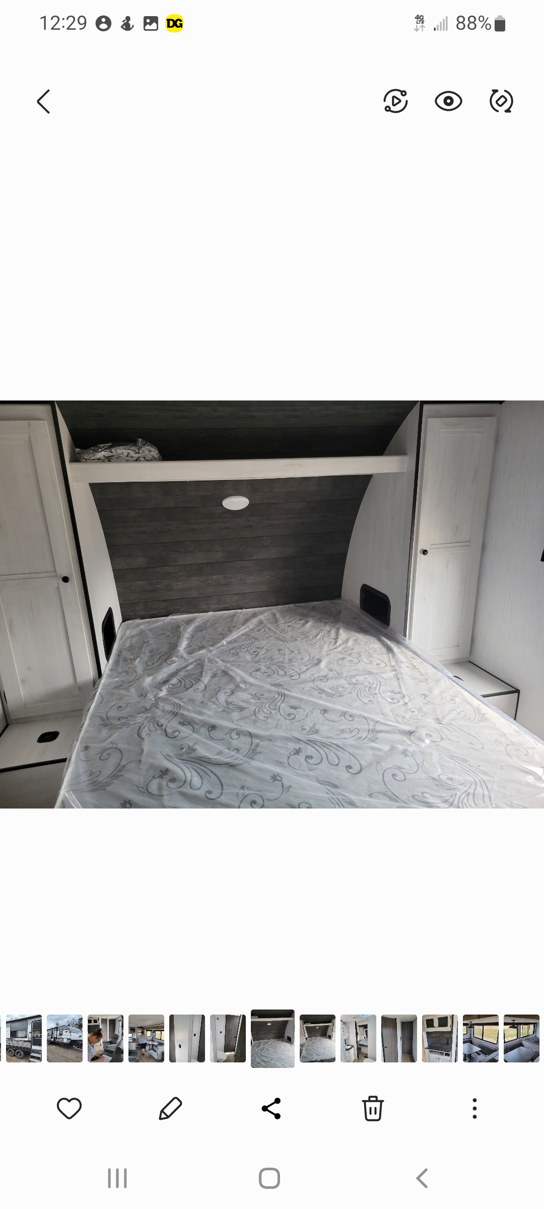 Inside this **rv rental**, discover a comfortable bedroom with a new, plastic-covered mattress, built-in storage, and sleek design.. Heartland RVs Trail Runner 2021