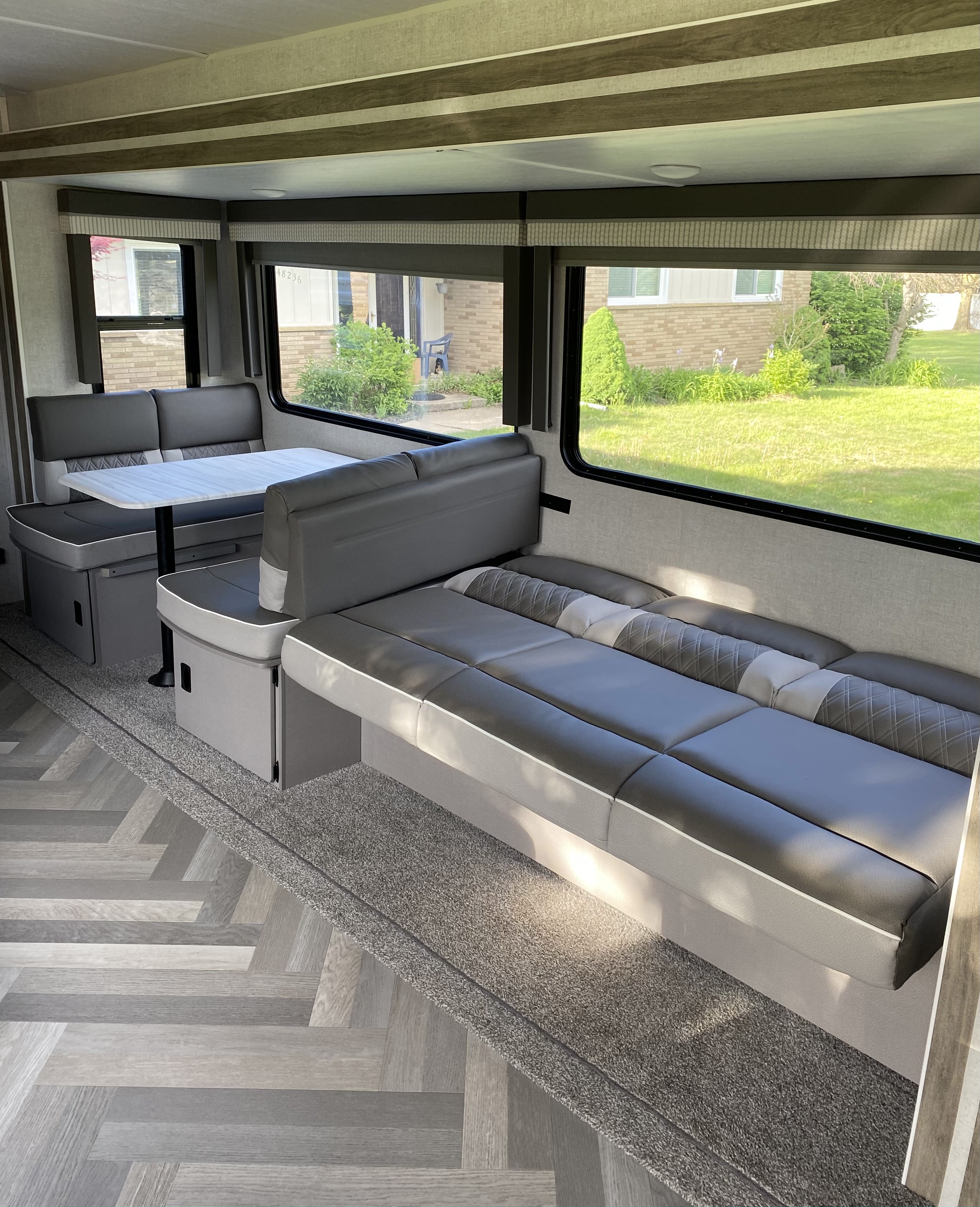 Sofa flattens to sleep 2 people (dining table also flattens to fit 1 adult or 2 small children). Forest River Salem 2021