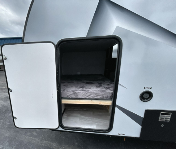 Ready for adventure? This RV rental offers an accessible exterior compartment, perfect for extra sleeping or storage.. Other Other 2022