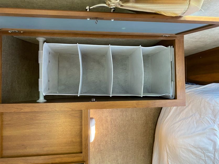 Each cabinet beside the queen has organizers we've found helpful for our clothes. They are easily removed if you don't prefer them. . Avenger Avenger Trailer 2015