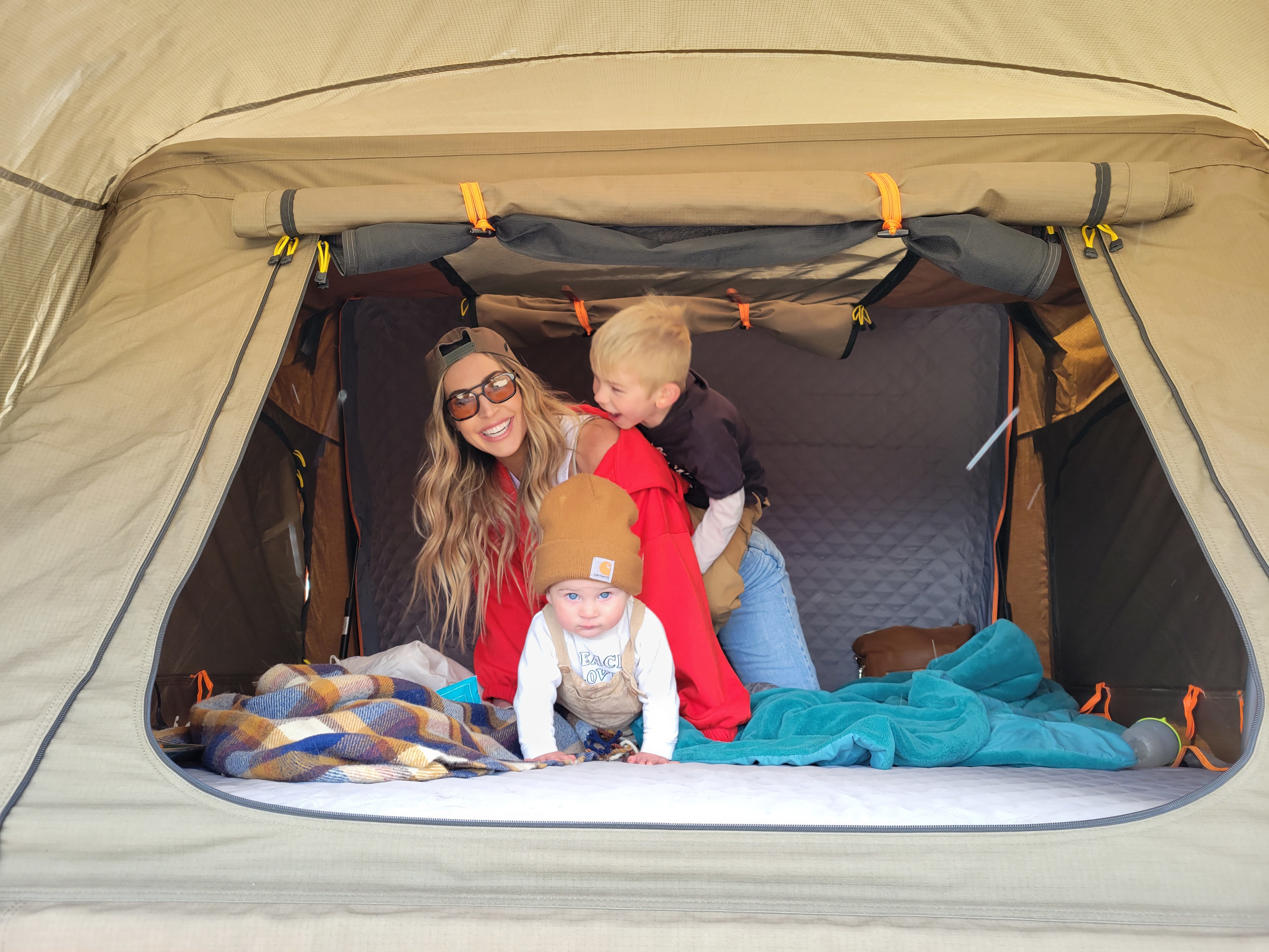 Family fun inside a comfortable tent. An RV rental adventure creating happy memories for mom, toddler, and baby.. Toyota Tundra 2011