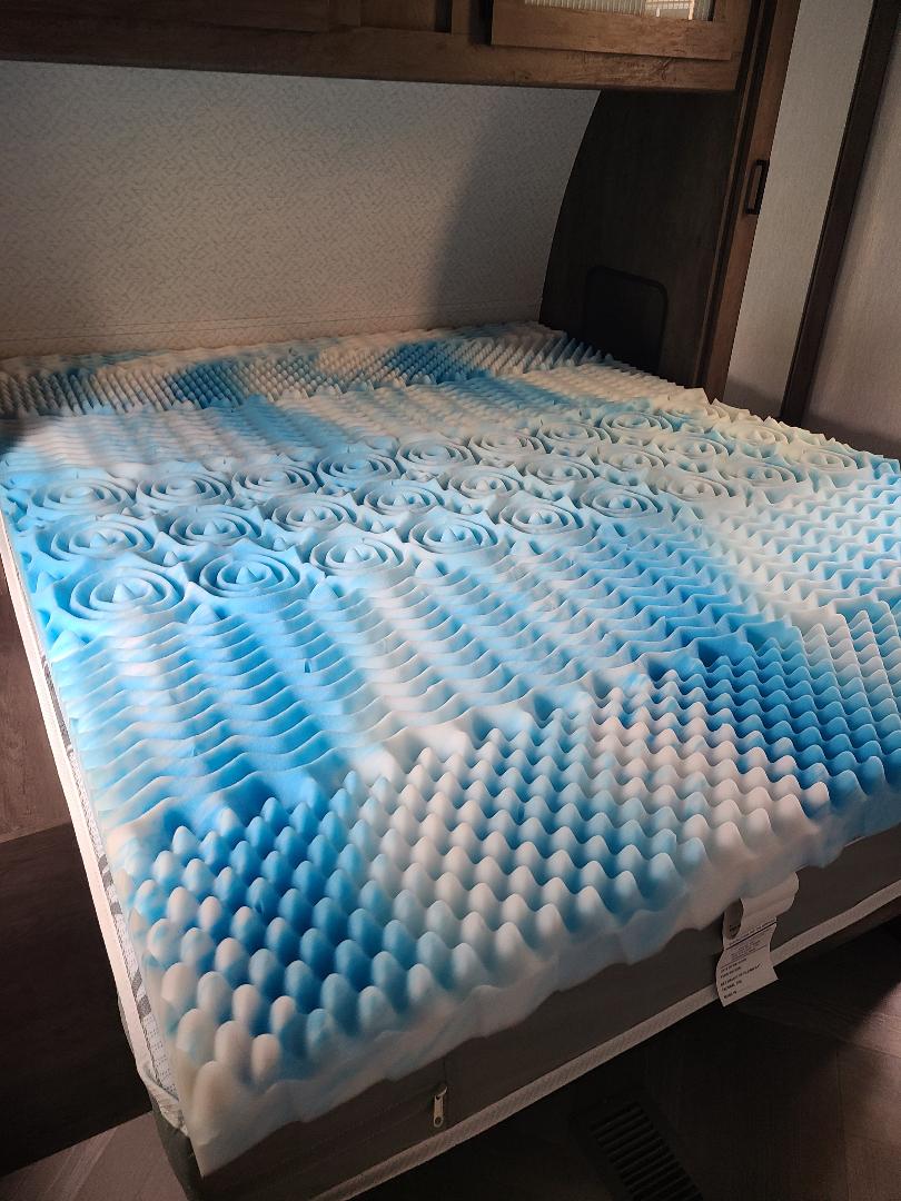 Upgrade your RV rental sleep! See this comfy blue & white foam mattress topper on an RV bed.. Forest River Salem 2022
