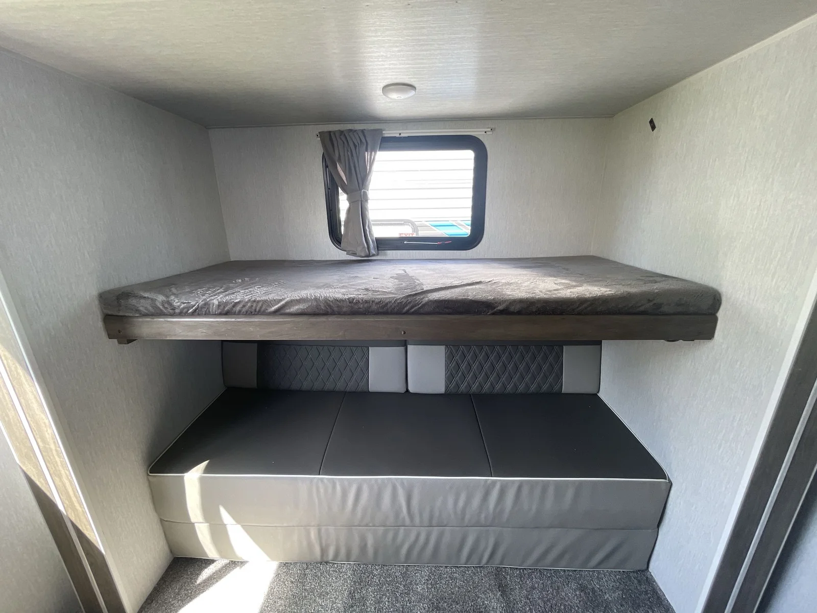 Bunk 2 on top with foldout couch/double bed underneath. . Forest River Salem 2021