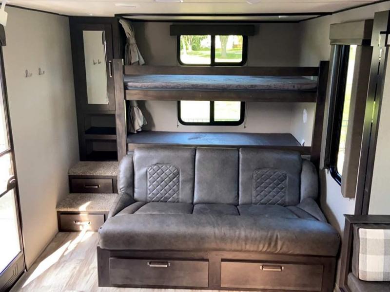 Two bulk beds and one sofa bed. Grand Design Transcend Xplor 2021