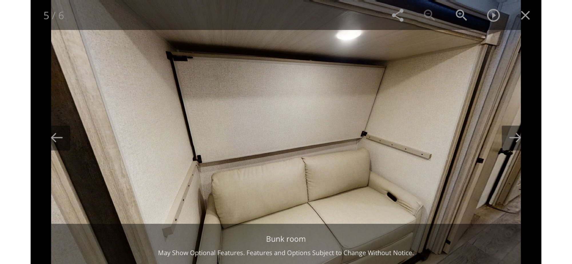 This RV rental bunk room features a comfortable sofa that likely converts to a bed, with an upper fold-down bunk.. Forest River Other 2022