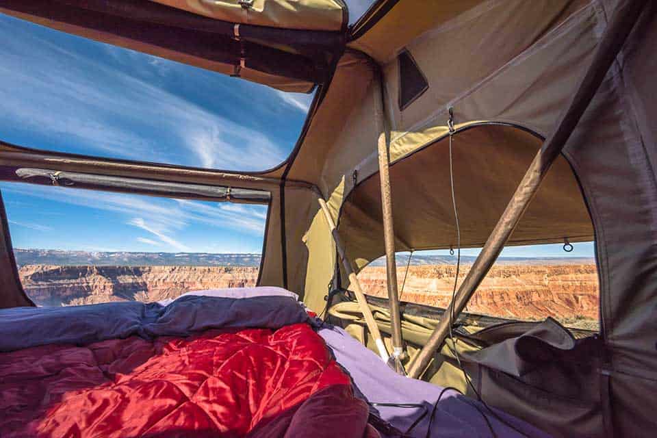 Stock interior shot of the RTT that sets up in 2 minutes! With rainfly and stargazing mesh! Plenty of interior pockets to stow items/hang lanterns!. TAXA Outdoors Woolly Bear Trailer 2020