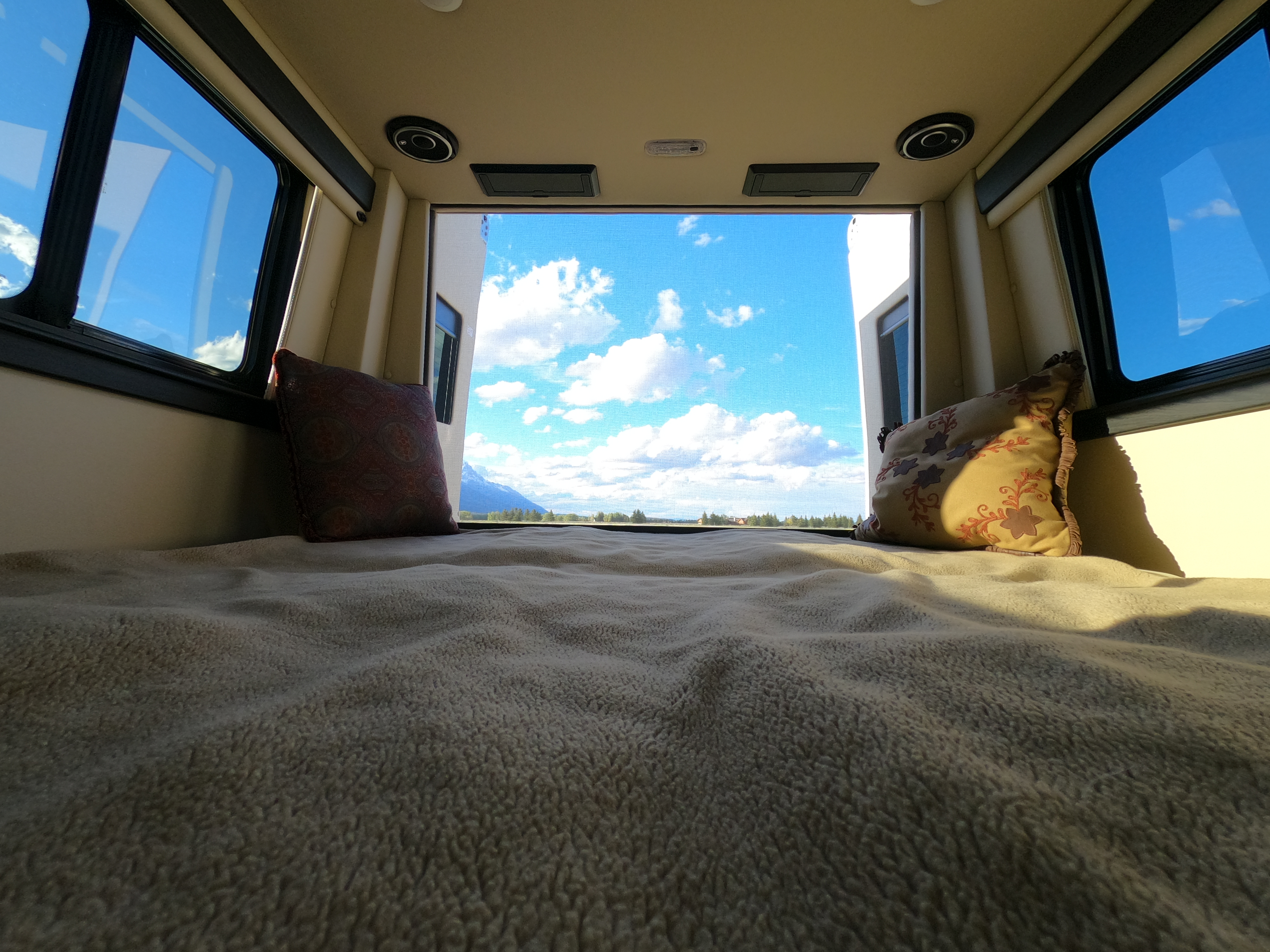 Relax in your RV rental with a panoramic view of blue skies, clouds, and mountains from the comfort of your bed.. Midwest Automotive Designs Midwest Automotive Designs Class B 2021