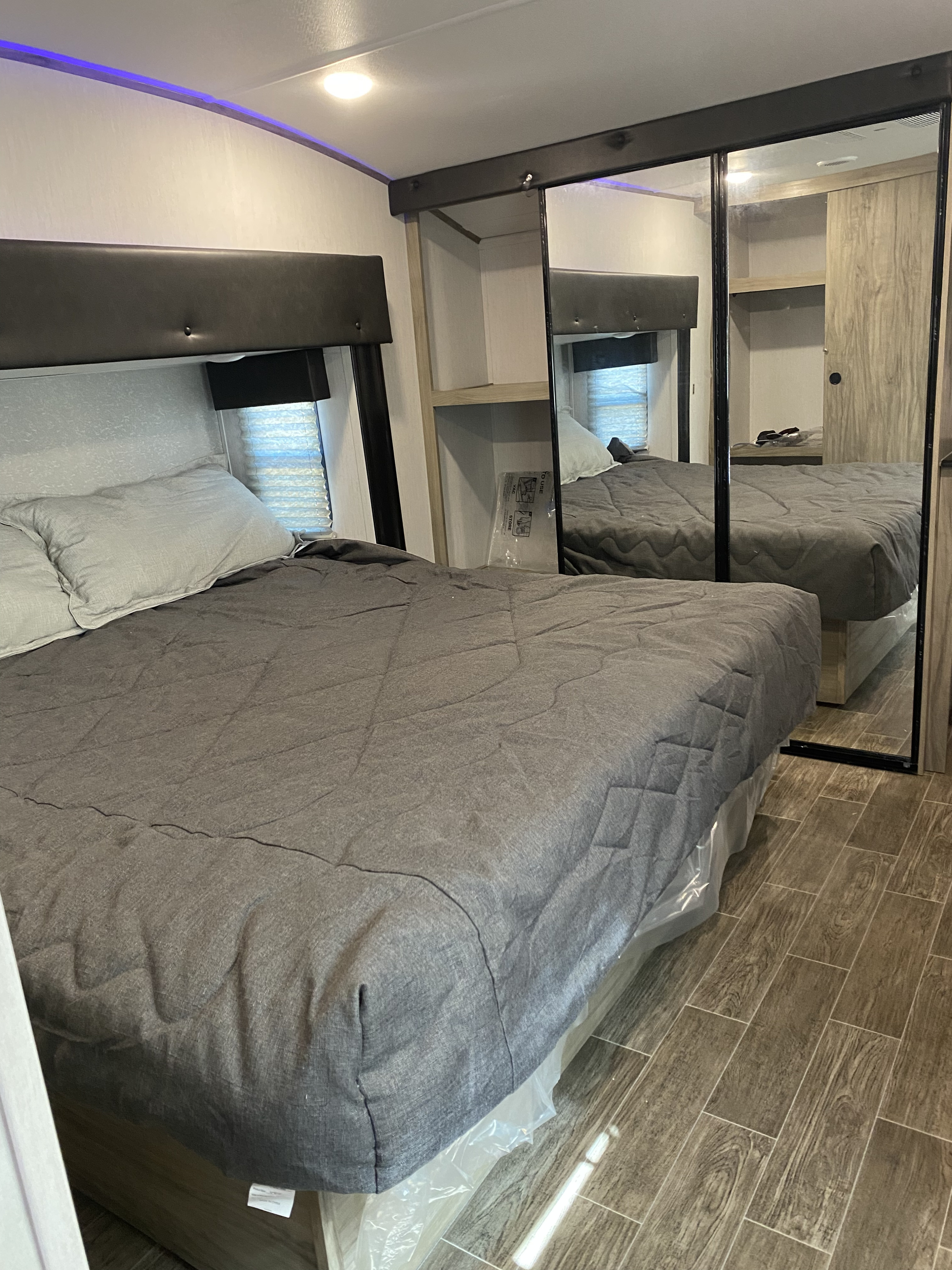 Master suite has two closets and a dresser.. Forest River Cherokee Arctic Wolf 2022