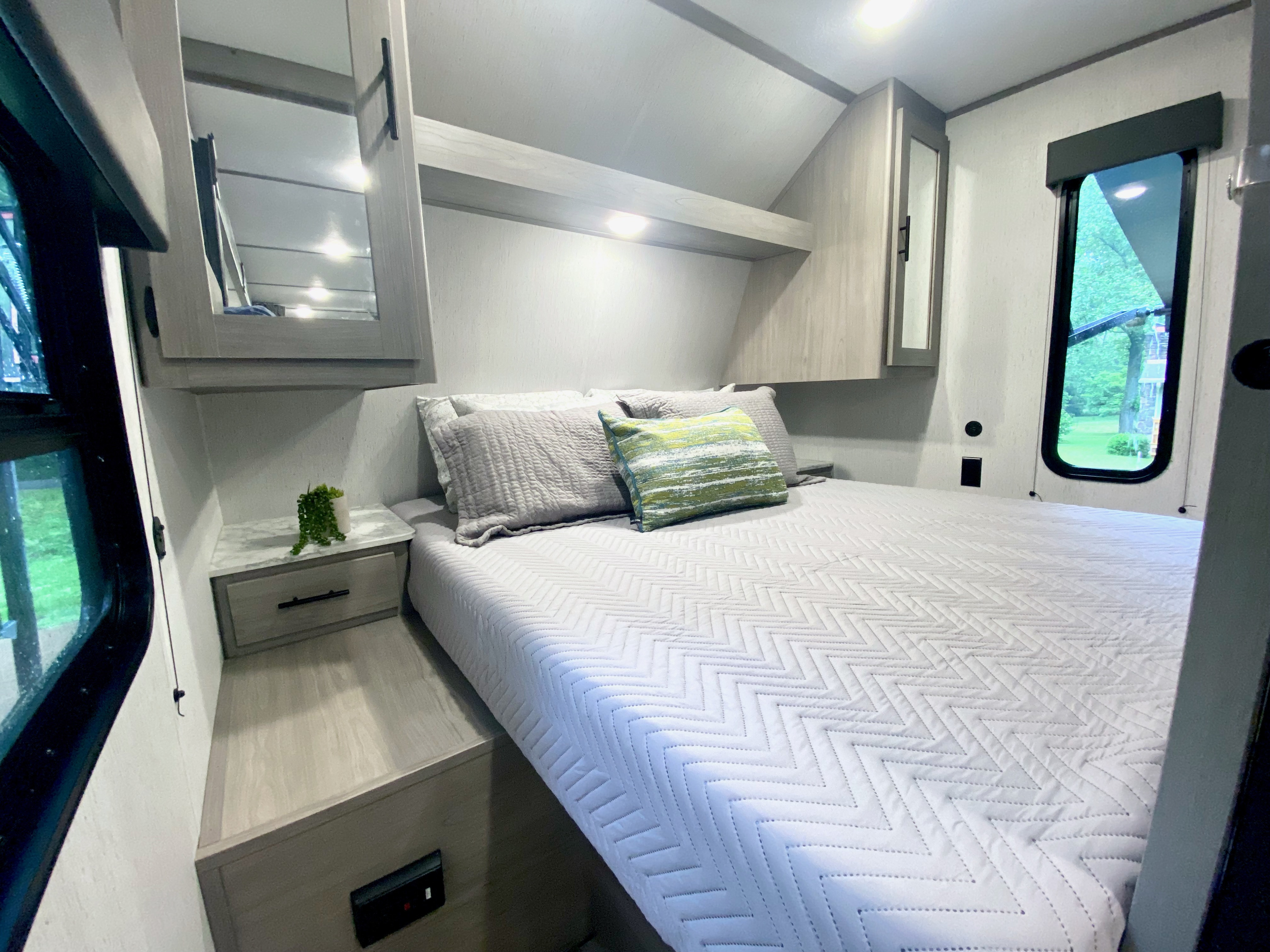 Master suite with comfortable queen bed, nightstands and usb chargers. Also has blackout shades for privacy and sleeping in!. Coleman Lantern 263BH 2022