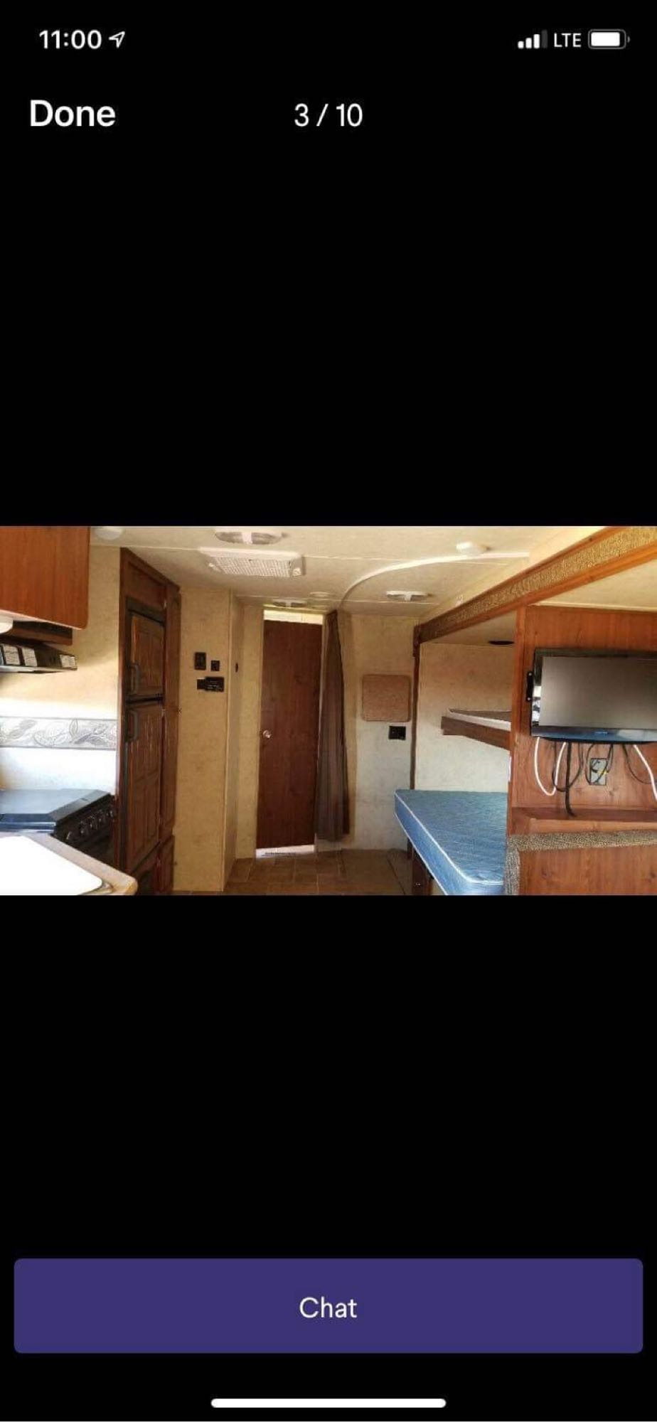 Inside this rv rental: kitchen, bunk beds, and TV. A cozy travel trailer living space.. Forest River Flagstaff Super Lite 2012