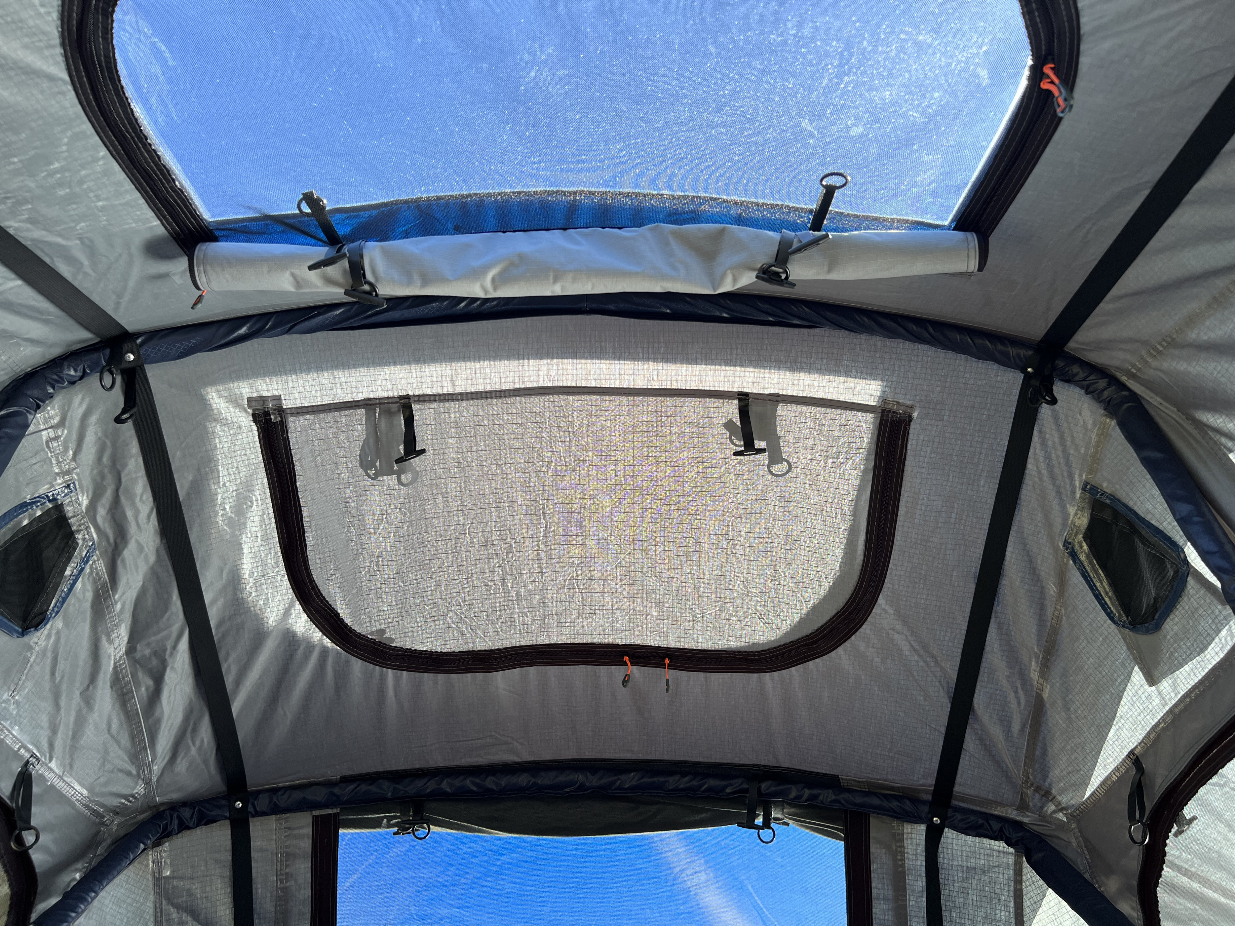 Inside the RTT - Windows on all sides and 2 in the Roof for Star Gazing - lots of Great Ventilation or Button her up for more Warmth. Taxa Outdoors Tiger Moth Overland 2022